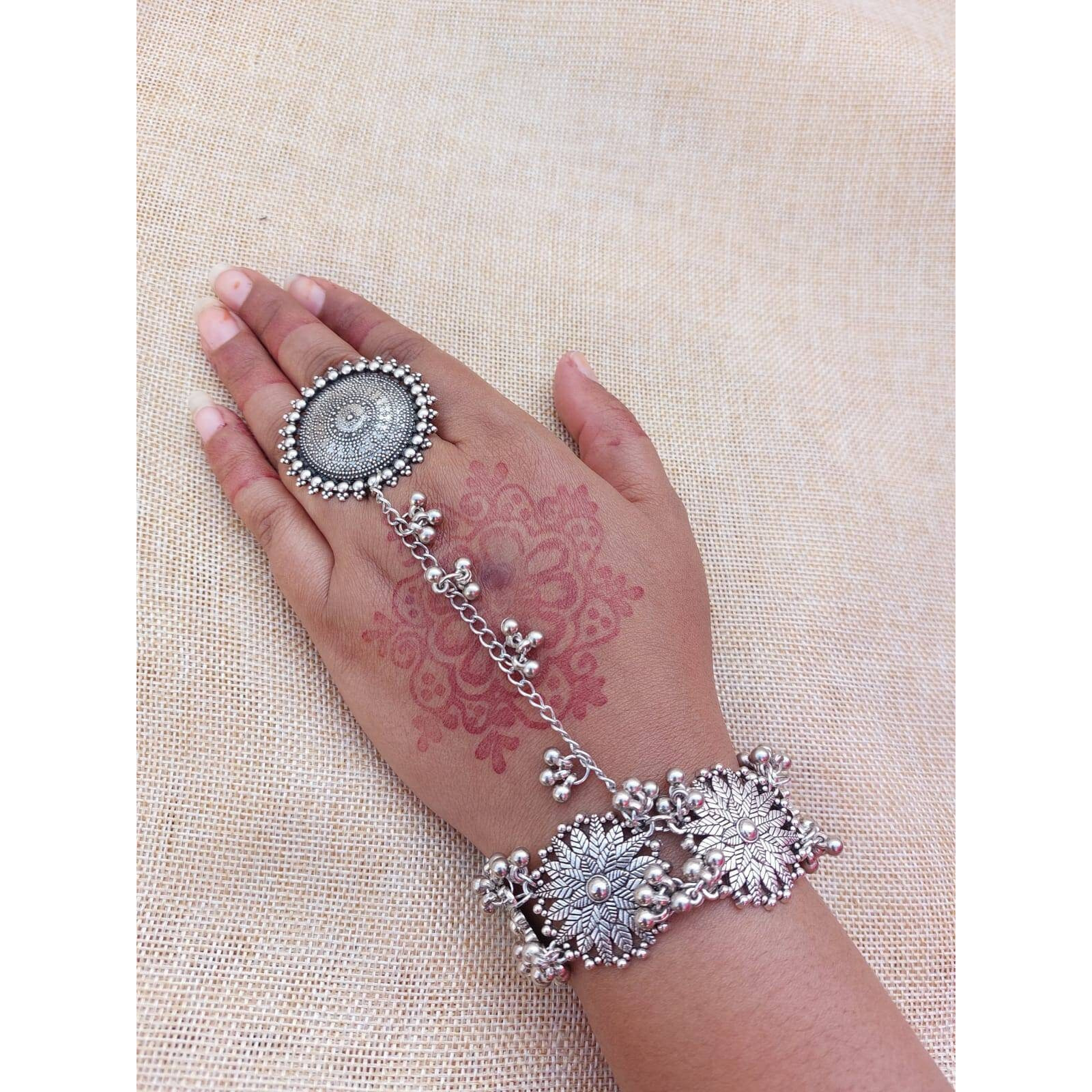 Traditional Rajasthani Silver Kada Bracelet, Broad Silver Kada, Handmade Bracelet, Party Wear Silver Stud Kada, Black Polish KadaBringing you a one-of-a-kind bracelet, a Kada that celebrates an intricate design. Loot compliments with this unique and quirky bracelet everywhere you step in These beautifully ornate antique kadas add a bling to your outfit and are perfect for weddings, anniversaries, and almost every occasion. When paired with casuals, it will create a cool boho look If you love t
