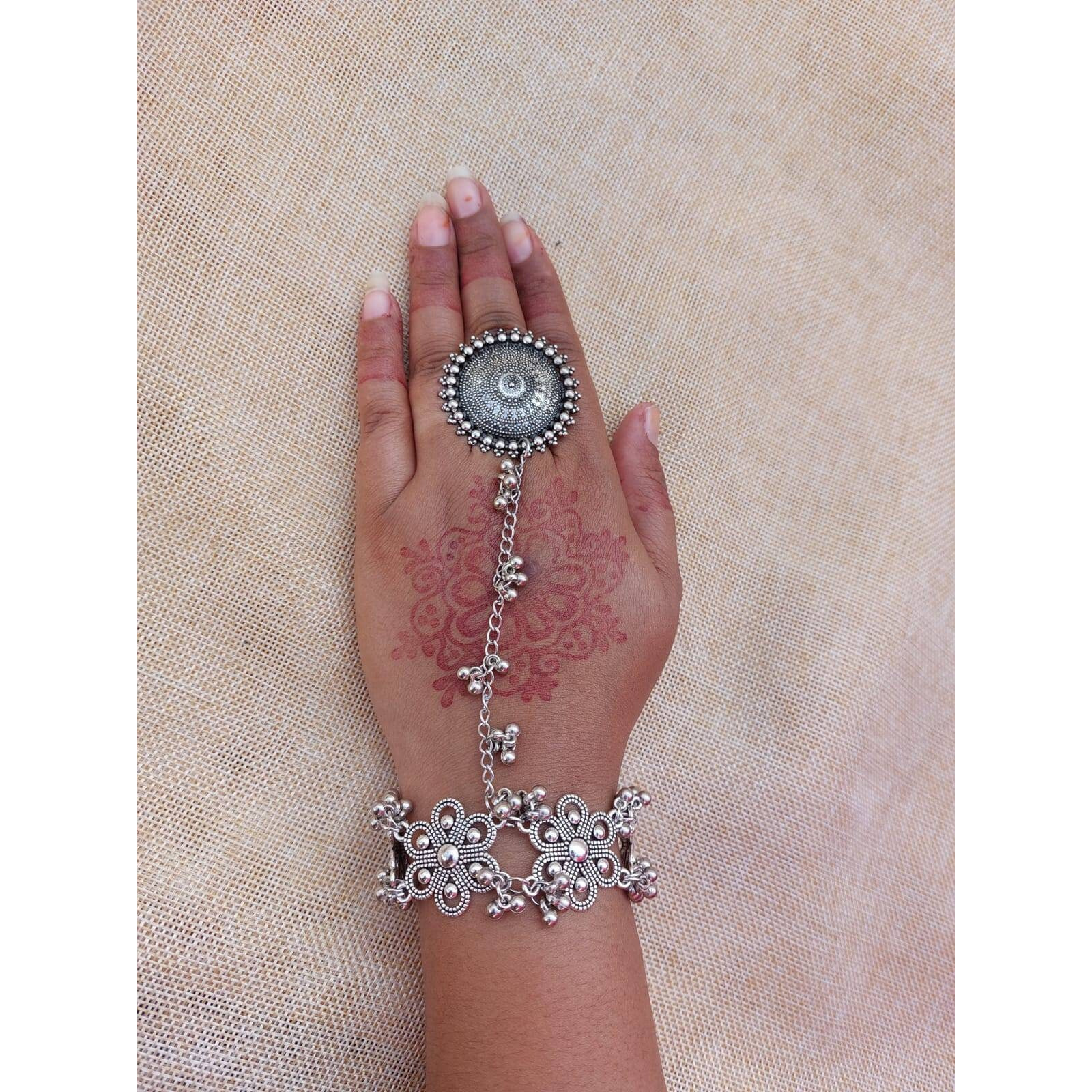 Traditional Rajasthani Silver Kada Bracelet, Broad Silver Kada, Handmade Bracelet, Party Wear Silver Stud Kada, Black Polish KadaBringing you a one-of-a-kind bracelet, a Kada that celebrates an intricate design. Loot compliments with this unique and quirky bracelet everywhere you step in These beautifully ornate antique kadas add a bling to your outfit and are perfect for weddings, anniversaries, and almost every occasion. When paired with casuals, it will create a cool boho look If you love t