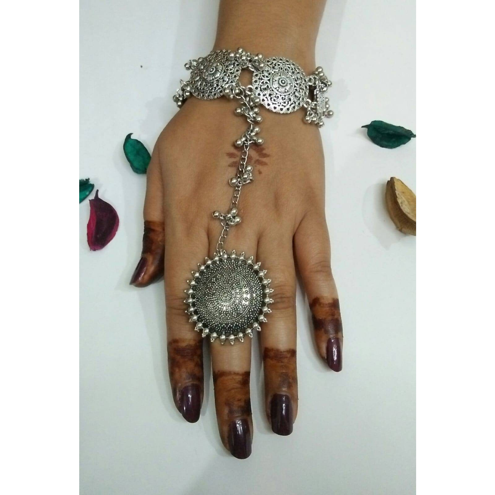 Traditional Rajasthani Silver Kada Bracelet, Broad Silver Kada, Handmade Bracelet, Party Wear Silver Stud Kada, Black Polish KadaBringing you a one-of-a-kind bracelet, a Kada that celebrates an intricate design. Loot compliments with this unique and quirky bracelet everywhere you step in These beautifully ornate antique kadas add a bling to your outfit and are perfect for weddings, anniversaries, and almost every occasion. When paired with casuals, it will create a cool boho look If you love t