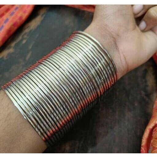 Grab this beautiful black polish Kada  and match it with any of the ethnic/ Indo western outfits, and look unique in crowd. This Kada/bracelet combines intricate detailing in a geometric line motif and contemporary design to help you make heads turn. The technique of oxidization has been used to give a dull sheen and bring out the exquisite design. This beautiful German silver bracelet is free of lead and nickel.   These gorgeous pieces won't cause any skin rash or irritation.  This bracelet is