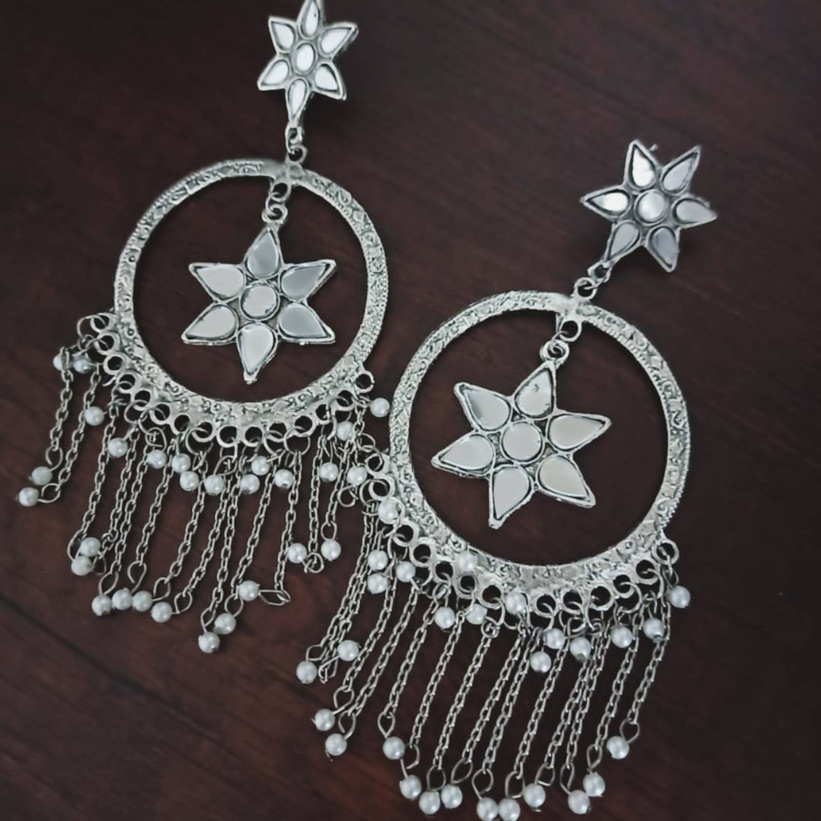 Colours signifies different power and energy This set is a reflection of the same. It will bring out the confidence in you and allow you a smart and bold styling with your favorite ethnics. It features colourful stones studded with dreamy pearl drops that add heaps of charm to the look. Be festive ready at all times with this set