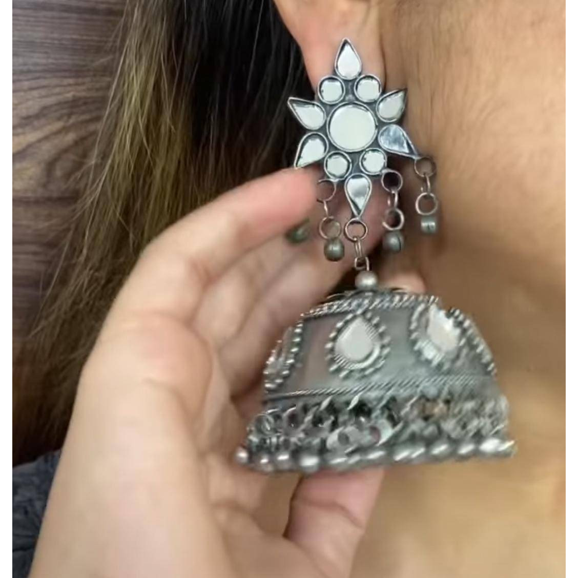 Trendy kettle shape design long earrings with alloy. Simple yet elegant danglers crafted with silver tone German Silver. Modern look which will fit with your whole wardrobe Earring Height 4.1 inch. Total Weight 39 gram. Keep your jewelry in dry, padded box to protect from scratches. Keep away from perfume, water other strong liquid