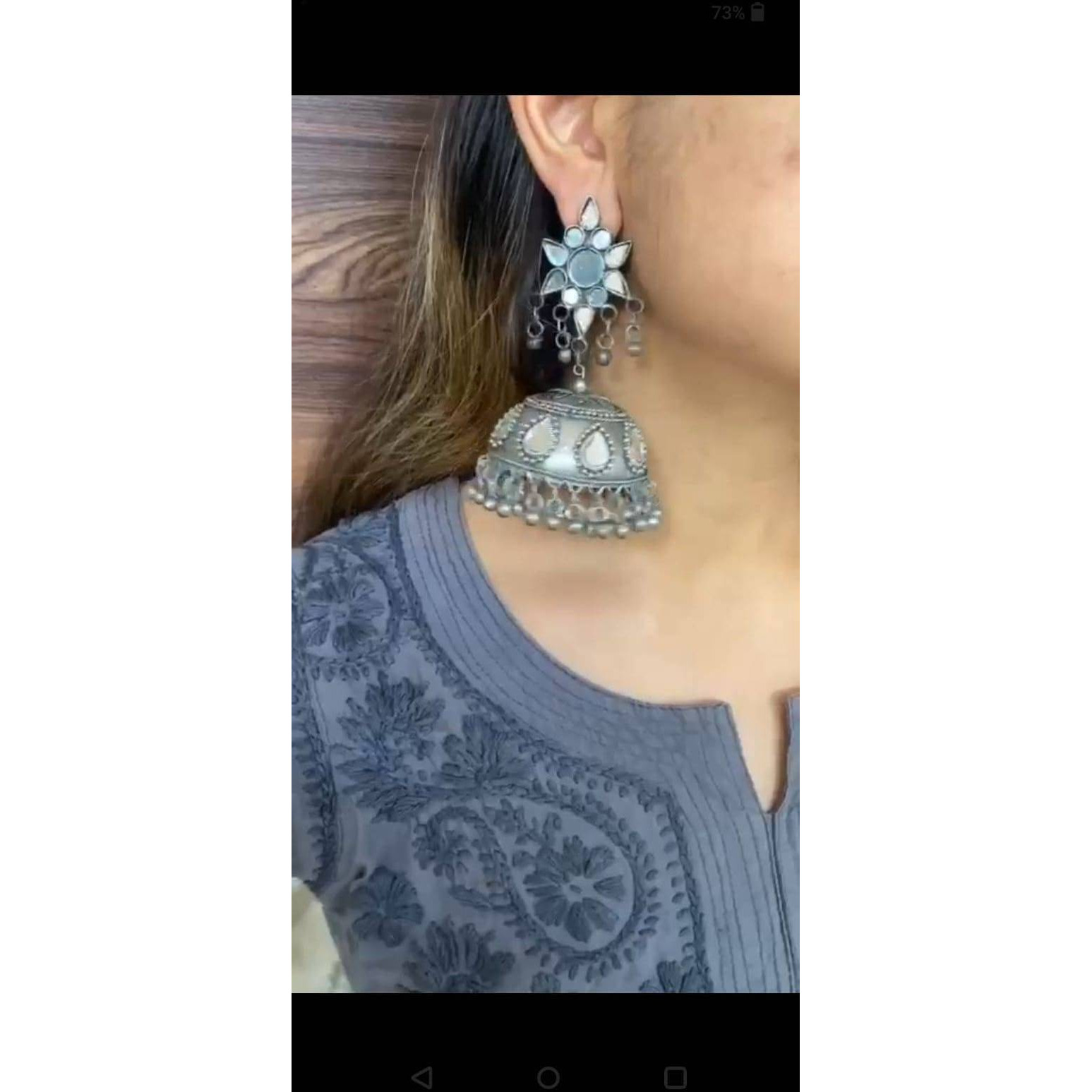 Trendy kettle shape design long earrings with alloy. Simple yet elegant danglers crafted with silver tone German Silver. Modern look which will fit with your whole wardrobe Earring Height 4.1 inch. Total Weight 39 gram. Keep your jewelry in dry, padded box to protect from scratches. Keep away from perfume, water other strong liquid