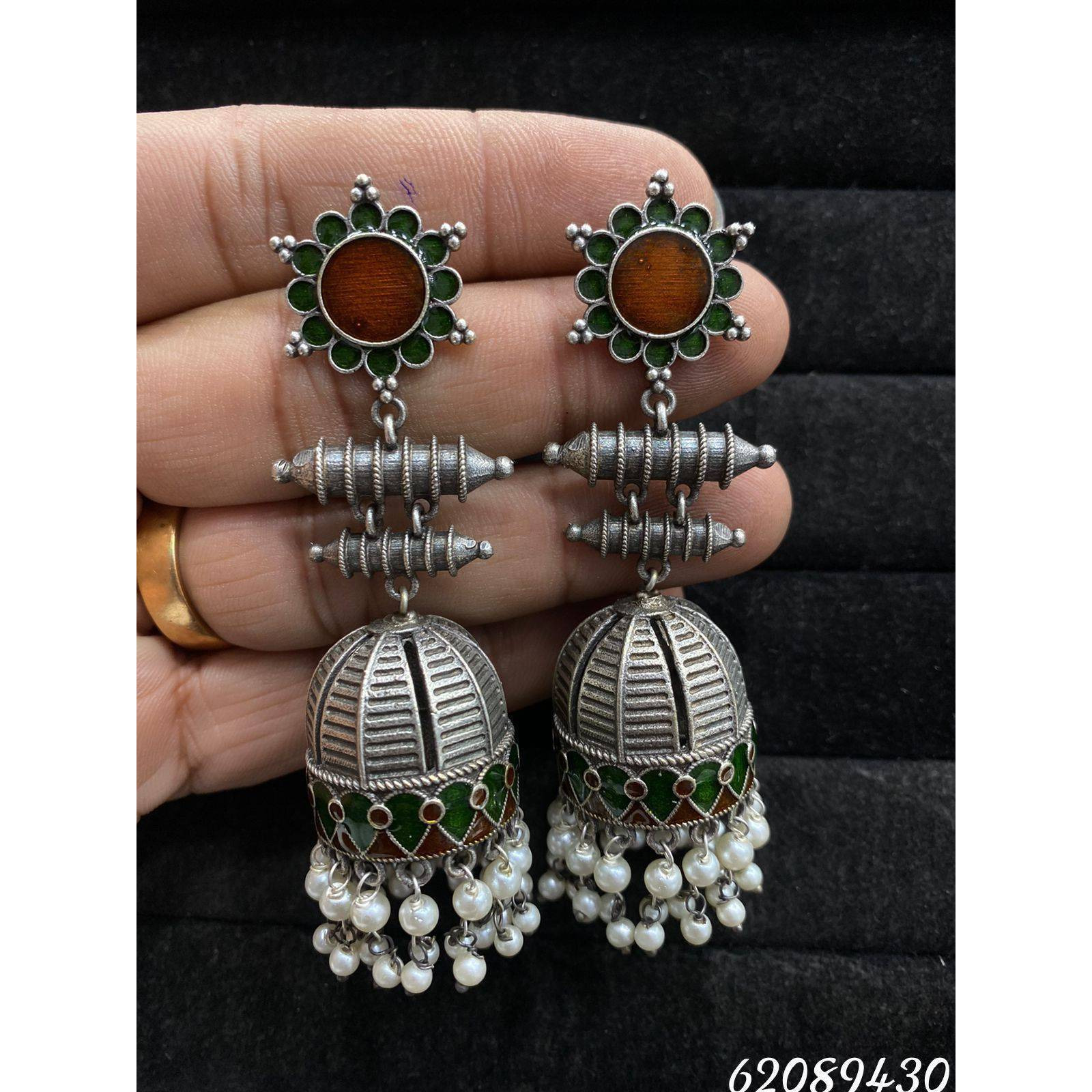 Beautiful Cage Scripted Jhumka Earrings, Oxidised Earrings With Pearls, Long Earrings, Indian Earrings, Bollywood Celebrity EarringsIf you are crazy about oxidized jewellery, and specifically in love with huge oxidized jhumkas then this pair of earrings is a must-have for your collection These birdcage scripted huge earrings will make you the queen of the crowd. This pair can amp up any ethnic outfit on any given day. Wear them in college, office, or an event, you definitely going to turn heads