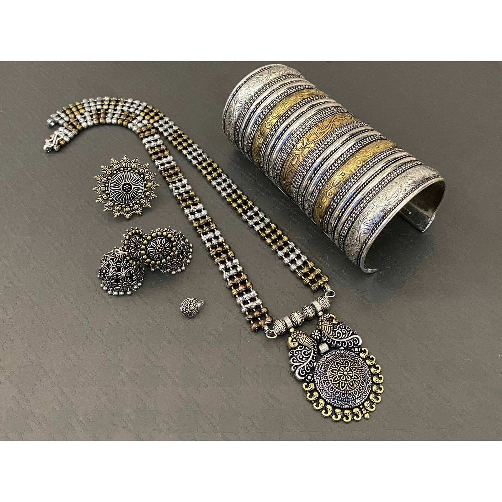Adorn your beautiful personality with this exquisitely designed and handcrafted necklace in high quality German Silver. Pair it up with any casual,semi formal or formal attire for that traditional yet contemporary look.