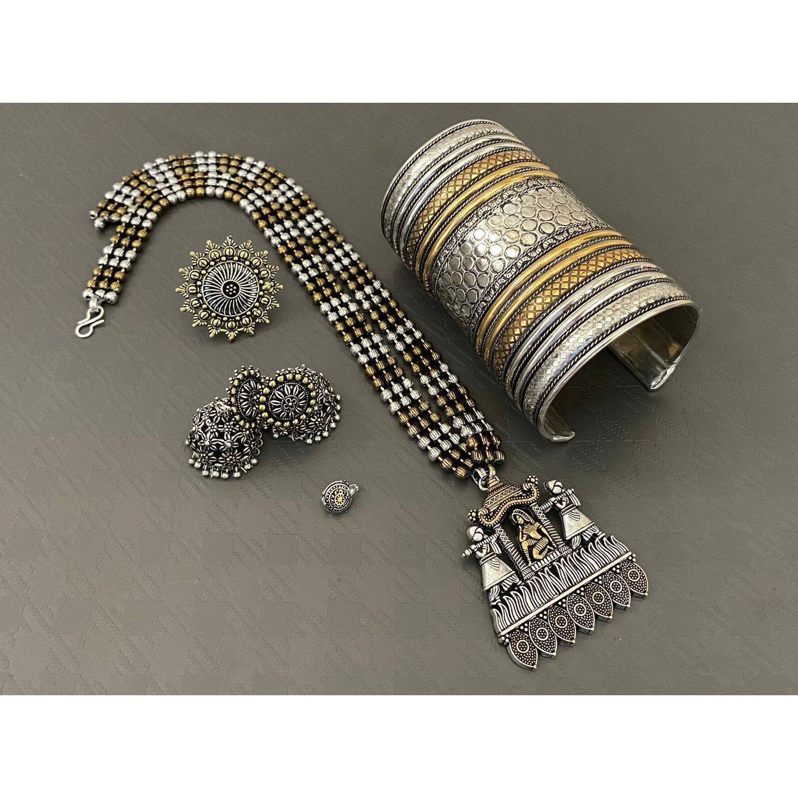 Adorn your beautiful personality with this exquisitely designed and handcrafted necklace in high quality German Silver. Pair it up with any casual,semi formal or formal attire for that traditional yet contemporary look.