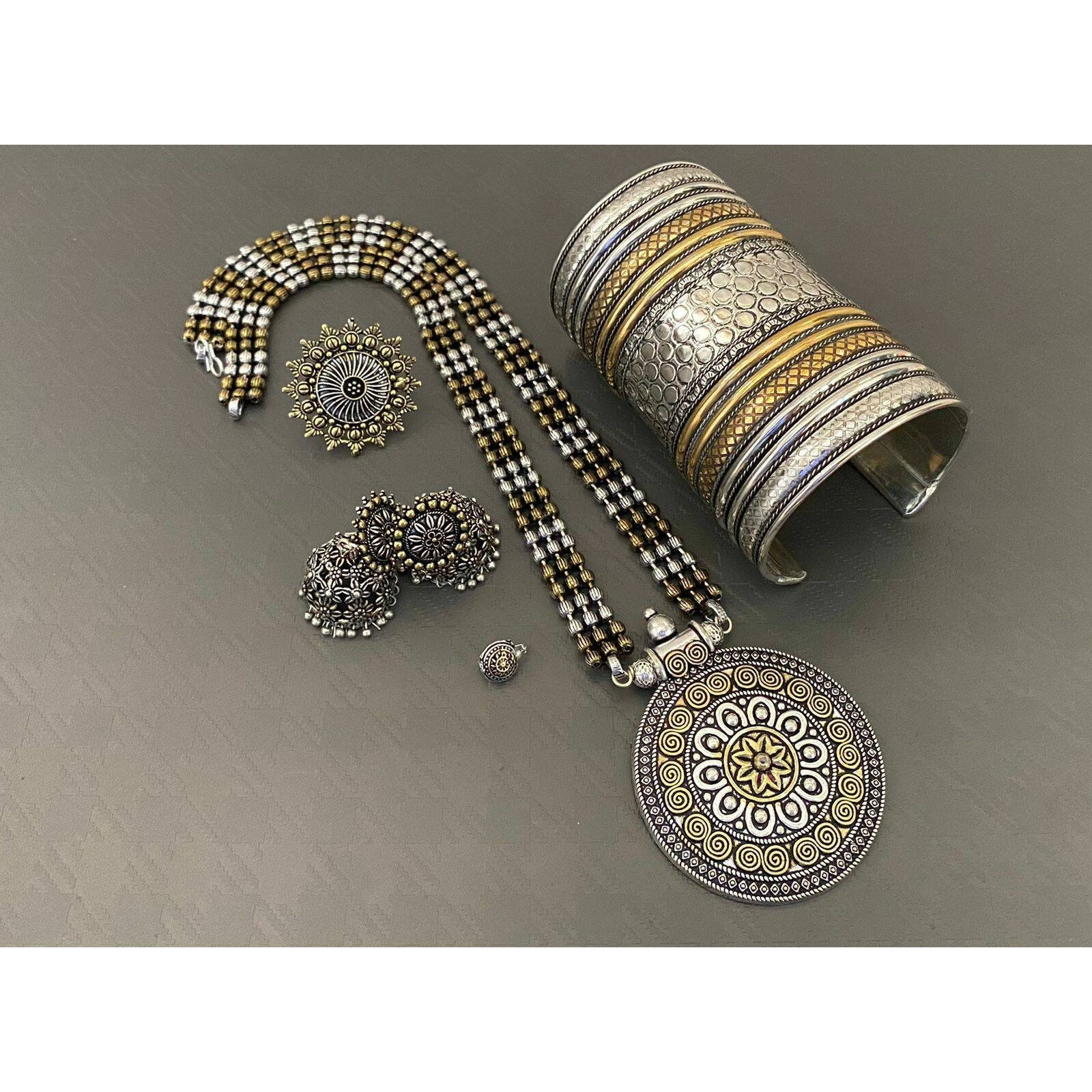 Adorn your beautiful personality with this exquisitely designed and handcrafted necklace in high quality German Silver. Pair it up with any casual,semi formal or formal attire for that traditional yet contemporary look.