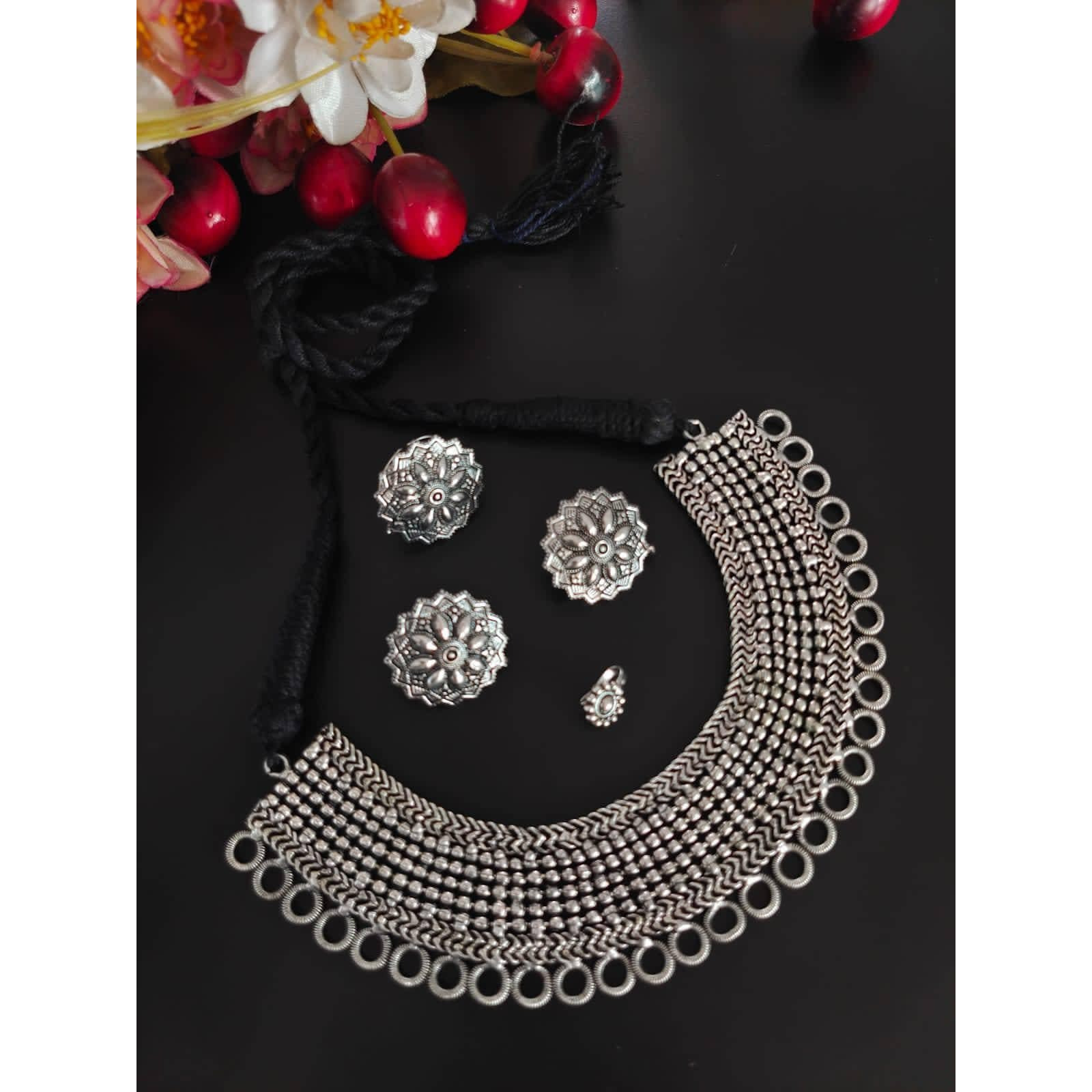 Inspired by the rich Islamic arabesque patterns and heavy ornate polki and pearl work during the mughal era , this intricately crafted stone statement earrings adds a dash of instant flair and royalty to your attires. Handcrafted in brass with pearldetails, this beautiful piece tells the story of bygone eras, heirloom jewels and sheer elegance. It adds the right finishing touch that will dress you up and leave you feeling pretty.