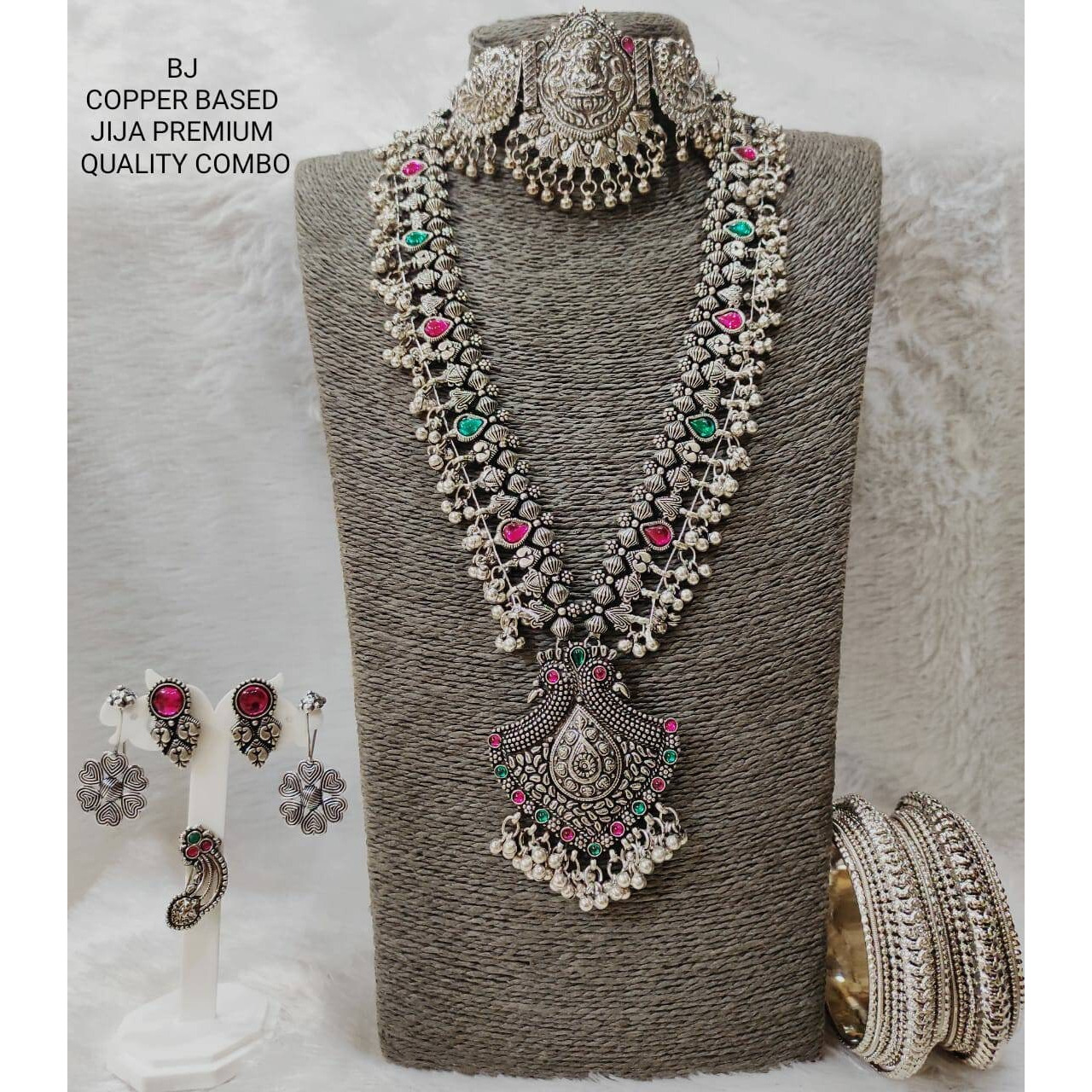Adorn your wrists with a beautiful chime. This bracelet adds a perfect amount of pretty you would like to add to your ethnic outfits. This bracelet kada is crafted in German silver and shiny bells that create a melody of charm and beauty. An accessory that will complete your look with minimum effort and maximum style quotient This Silver Oxidised Bangle kada boasts beautiful Maa Durga motifs that will always keep you rooted in Indian History. Crafted in oxidized silver and playful ghungaroos, t