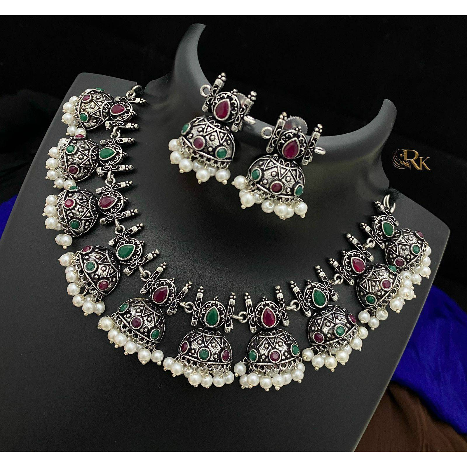 Its no secret that Boho is the new cool. If you follow trends, then this dual-tone oxidized jewelry set might be the one for you. Featuring a luxurious blend of gold and silver-tone, this combo is the epitome of style and class. This Indian jewelry set comes in a five-piece combo consisting of a necklace, earrings, ring, pin, and bracelet. This hippie Kemp tribal handmade jewelry can be a perfect wedding gift for your loved ones. Its boho look can be a great fit with almost any outfit. M