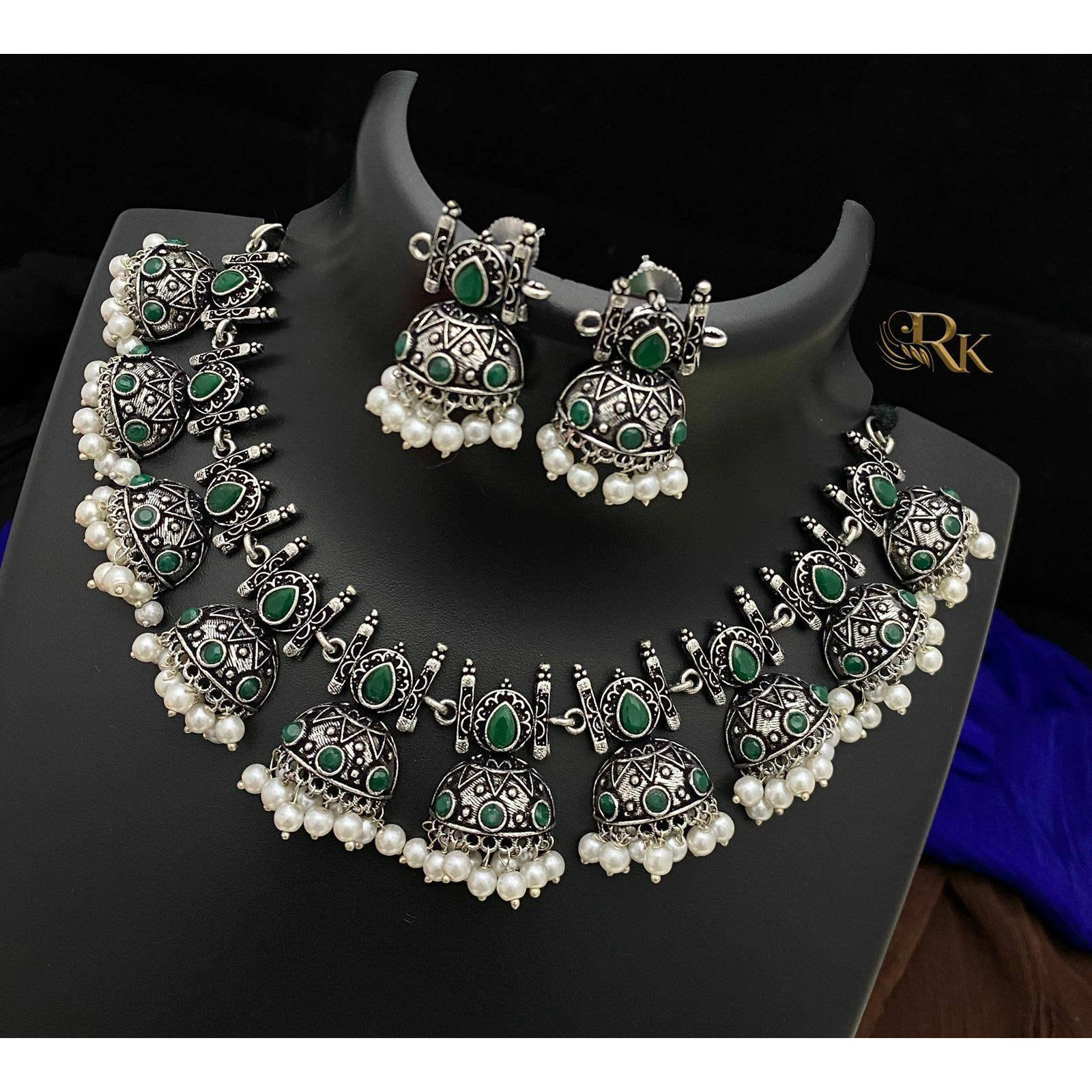 Its no secret that Boho is the new cool. If you follow trends, then this dual-tone oxidized jewelry set might be the one for you. Featuring a luxurious blend of gold and silver-tone, this combo is the epitome of style and class. This Indian jewelry set comes in a five-piece combo consisting of a necklace, earrings, ring, pin, and bracelet. This hippie Kemp tribal handmade jewelry can be a perfect wedding gift for your loved ones. Its boho look can be a great fit with almost any outfit. M