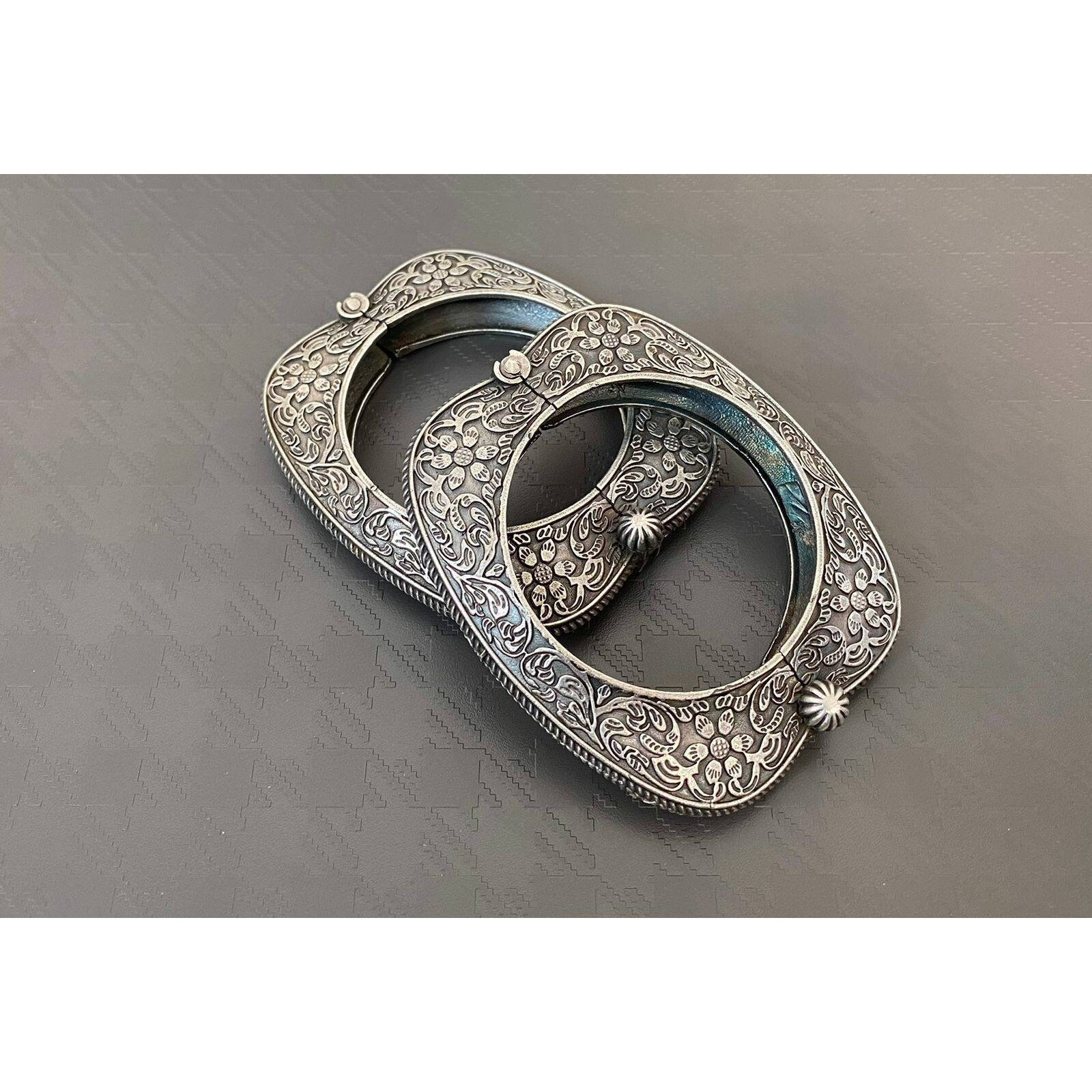 A striking jewellery set handcrafted in oxidized silver brimming with shiny metal pieces that lends grace to your look and is bound to shine on your colorful outfits. Dress up an occasion with this ornate piece of jewelry that will make you fall in love with statement makers. This necklace set will be your go-to jewelry for any occasion