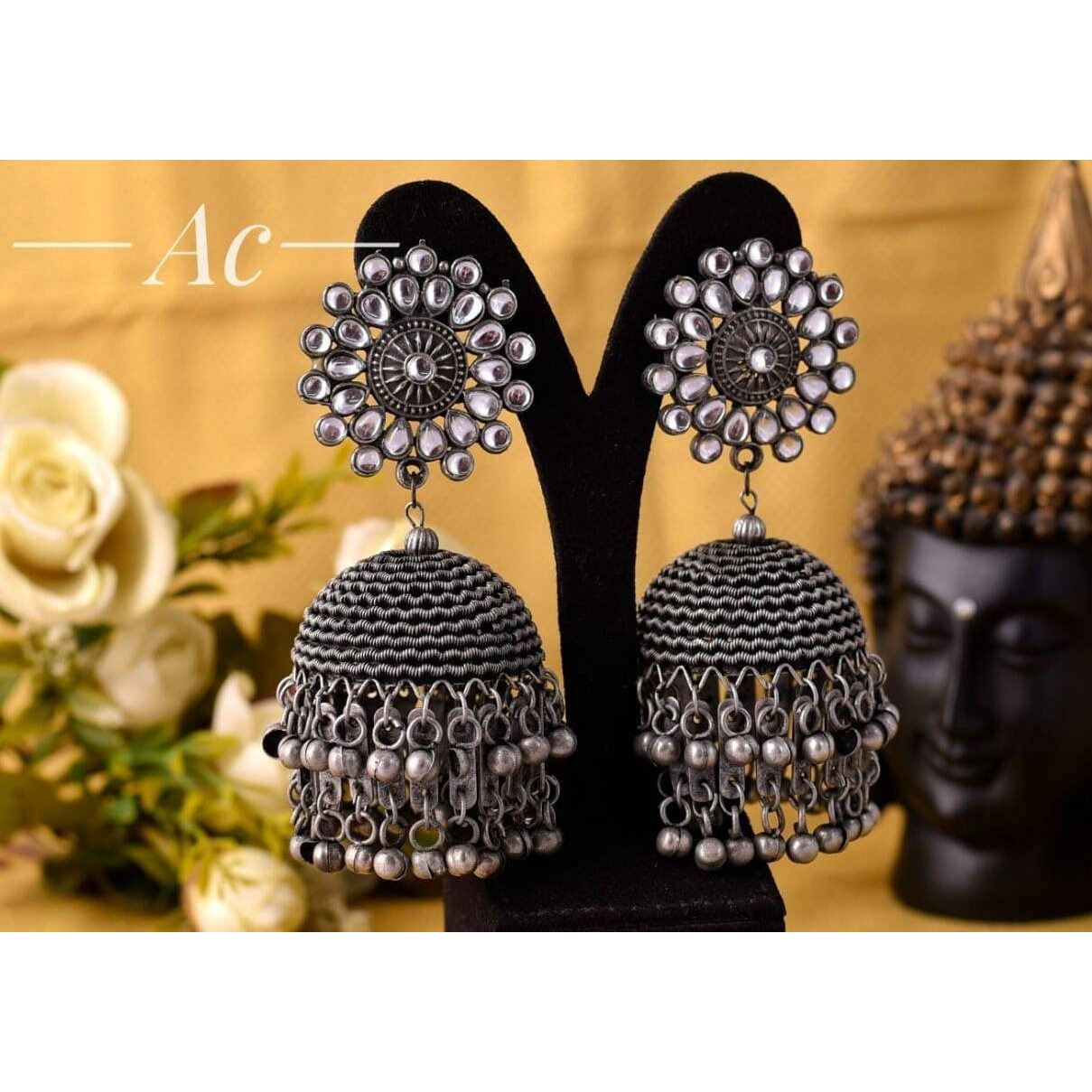 Grab this beautiful round oxidized Jhumka Earring with hanging and pair it with any of the outfit and get the overall elegant look