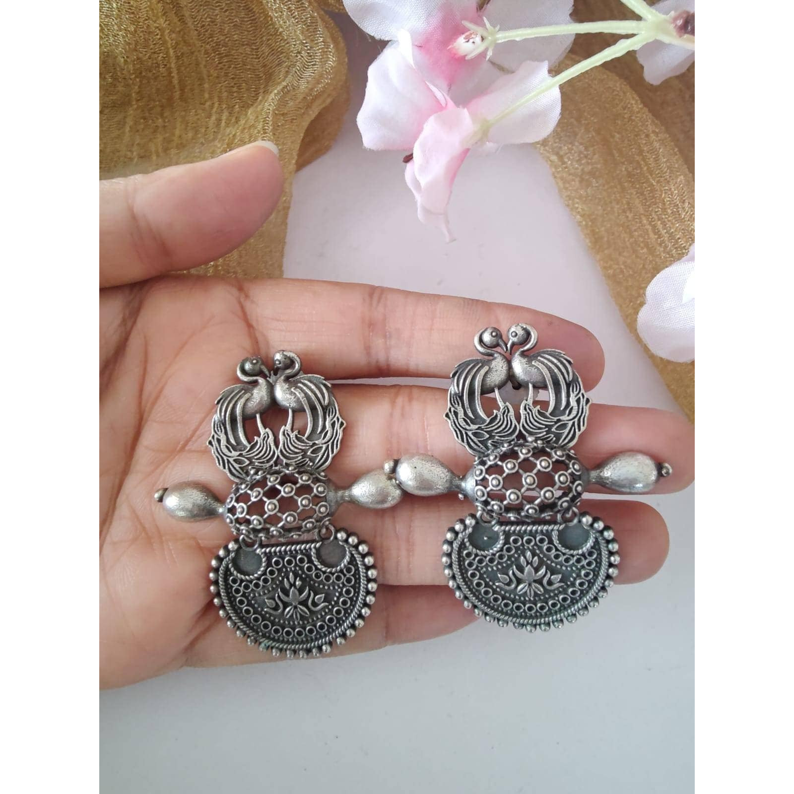 Nothing can beat the basic earrings when it comes to smartness quotient. Our Silver Oxidized  Earrings, Minimal and to the point, these earrings impart an effortless take to accessorising. These earrings are just what you need to complete a casual denim look or breezy dresses on hot summer days.