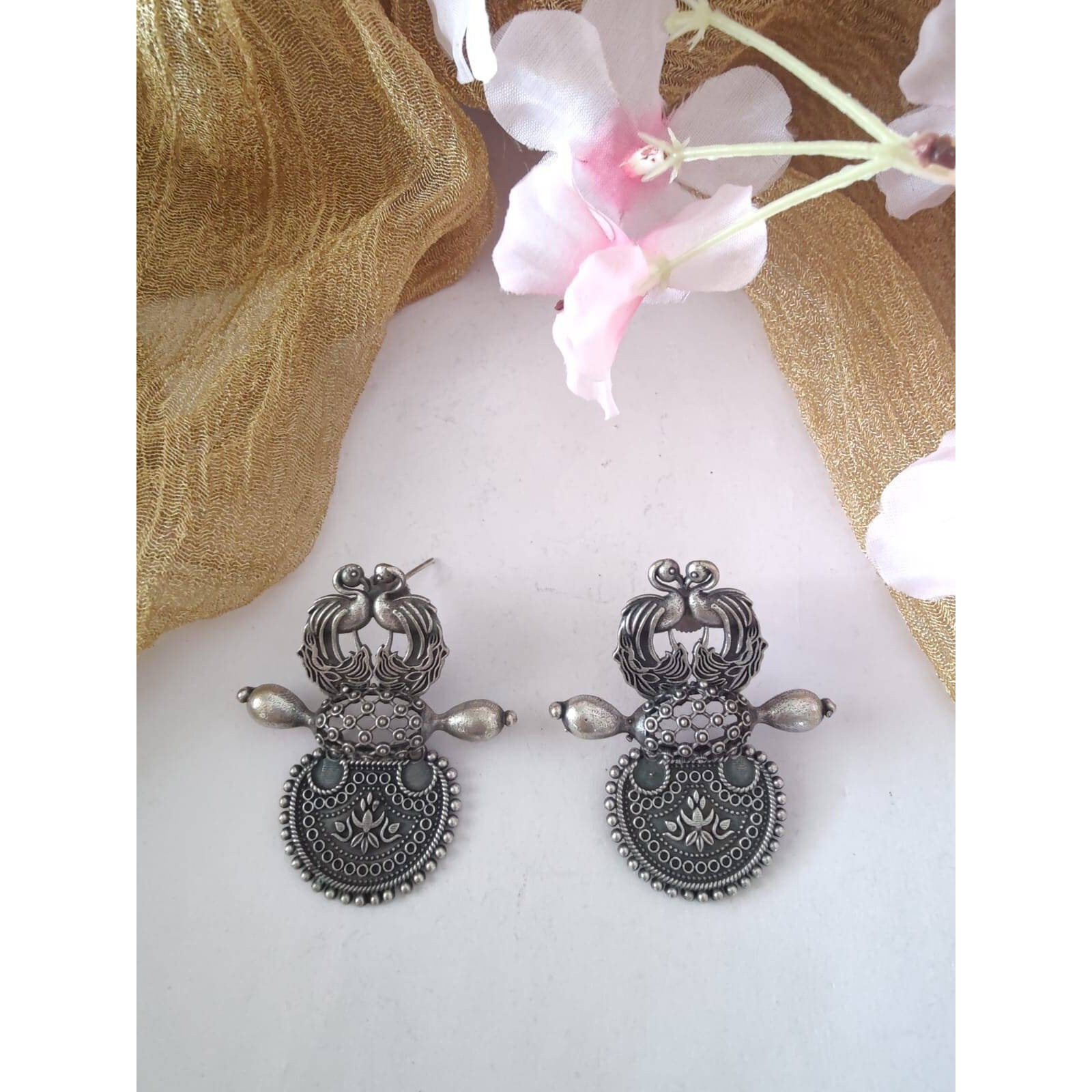 Nothing can beat the basic earrings when it comes to smartness quotient. Our Silver Oxidized  Earrings, Minimal and to the point, these earrings impart an effortless take to accessorising. These earrings are just what you need to complete a casual denim look or breezy dresses on hot summer days.