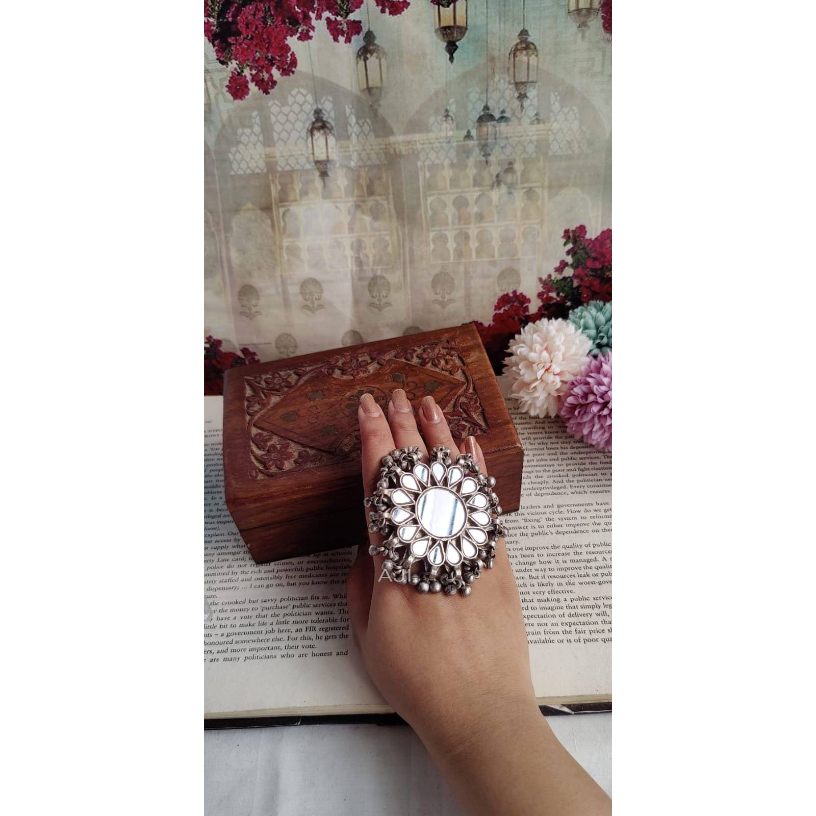 Add ethnicity and elegance to your beautiful personality with these exquisitely designed handmade earrings with pearls drop. The intricate designs gives these earrings a very classy touch. Wear them with any semi formal or casual attire and gather compliments all the way