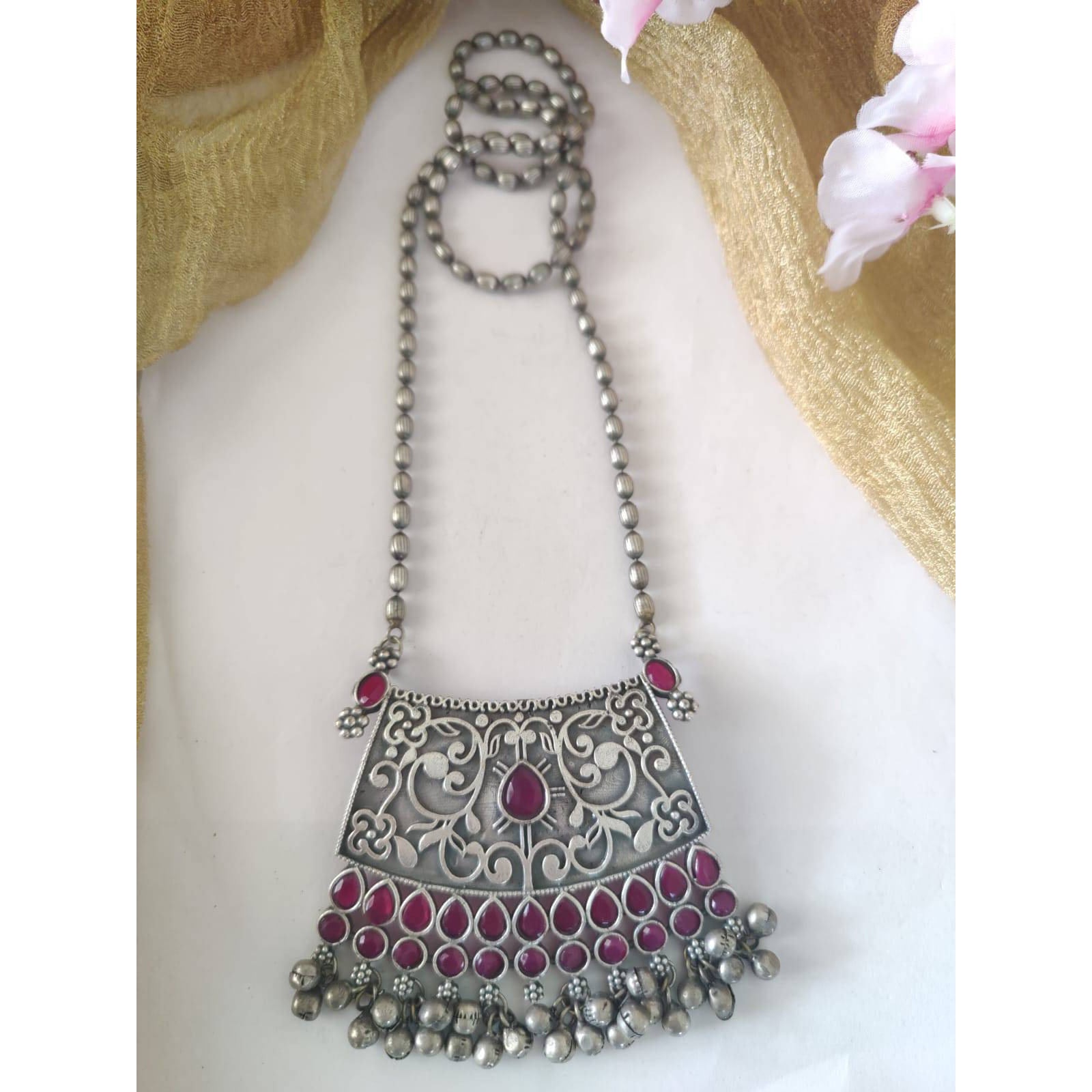 Adorn your beautiful personality with this exquisitely designed and handcrafted necklace in high quality German Silver. Pair it up with any casual,semi formal or formal attire for that traditional yet contemporary look.Premium quality