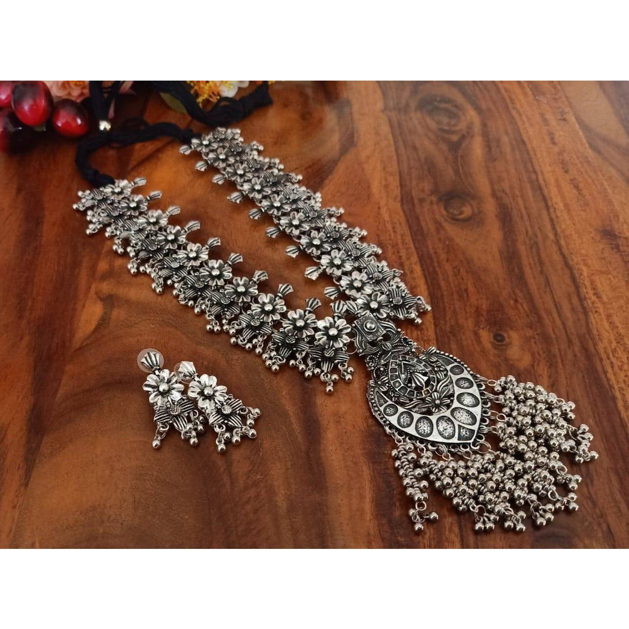 In love with oxidized jewelry? This long necklace with earrings combo is surely going to be anamazing choice. The trendy, elegant and sophisticated Indian Jewelry is ideal for casual occasions aswell as parties. Its Victorian design is absolutely eye-catching and is surely going to be a head-turner.You can also pair this with Indian and western outfits or purely ethnic dresses and win complimentslike never before.Jewelry care tips??????? Oxidized silver jewelry should not be exposed to sweat or