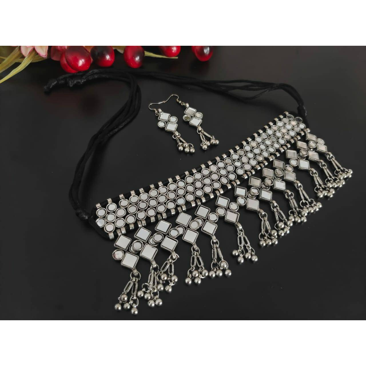 Women Silver Oxidised jhumki necklace set.The Perfect Gift  Ideal for the Woman who loves products that are Handmade In India and artisinal. All occassion jewelery for through out the year from Valentines Day ,a Special Birthday or an Anniversary gift for your special one. 100% Genuine Quality Product. 100% Handmade in India with Love.Usage Avoid contact with water and organic chemicals i.e. perfume sprays. Avoid using velvet boxes, and store in air-tight boxes. After use, wipe the jewellery w
