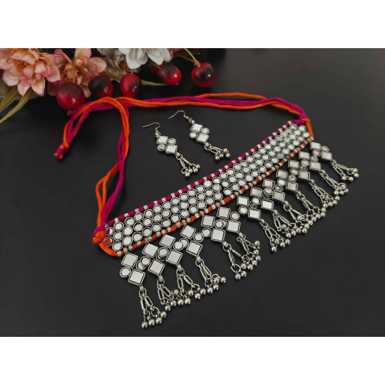 Women Silver Oxidised jhumki necklace set.The Perfect Gift  Ideal for the Woman who loves products that are Handmade In India and artisinal. All occassion jewelery for through out the year from Valentines Day ,a Special Birthday or an Anniversary gift for your special one. 100% Genuine Quality Product. 100% Handmade in India with Love.Usage Avoid contact with water and organic chemicals i.e. perfume sprays. Avoid using velvet boxes, and store in air-tight boxes. After use, wipe the jewellery w