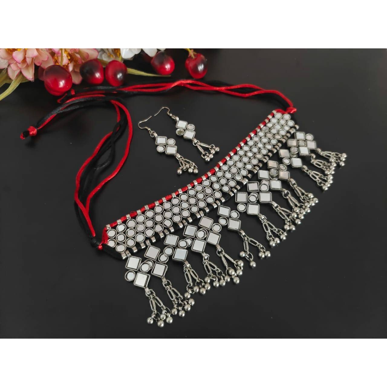 Women Silver Oxidised jhumki necklace set.The Perfect Gift  Ideal for the Woman who loves products that are Handmade In India and artisinal. All occassion jewelery for through out the year from Valentines Day ,a Special Birthday or an Anniversary gift for your special one. 100% Genuine Quality Product. 100% Handmade in India with Love.Usage Avoid contact with water and organic chemicals i.e. perfume sprays. Avoid using velvet boxes, and store in air-tight boxes. After use, wipe the jewellery w