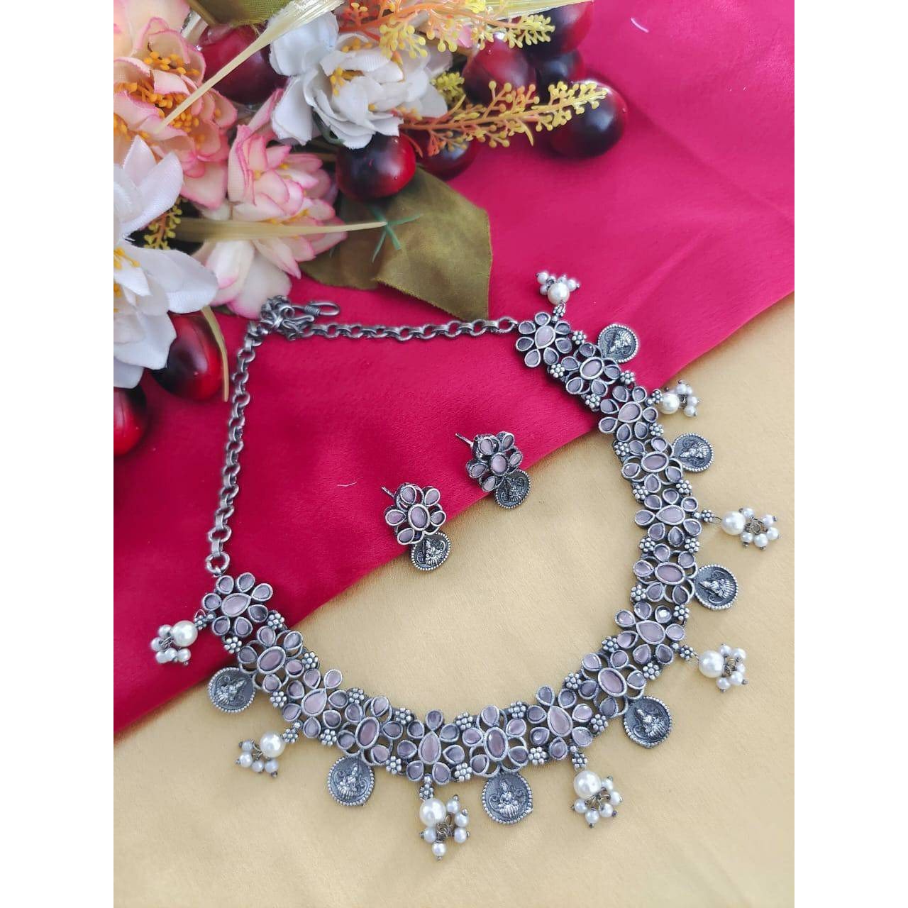 MATERIAL Oxidised German silver gives a classy finish to the set. The German silver plating used when combined with the design gives a uniquely traditional look to the jewelry set. That is strong and long-lasting.OCCASION Will add lustre when worn for a wedding, engagement, party, prom and any special occasion. Will enhance special days like Valentine's day, Birthdays, Anniversaries, and Mother's Day.CARE INSTRUCTION  Avoid Heat & Chemicals Like Perfume, Deo, Alcohol, Etc