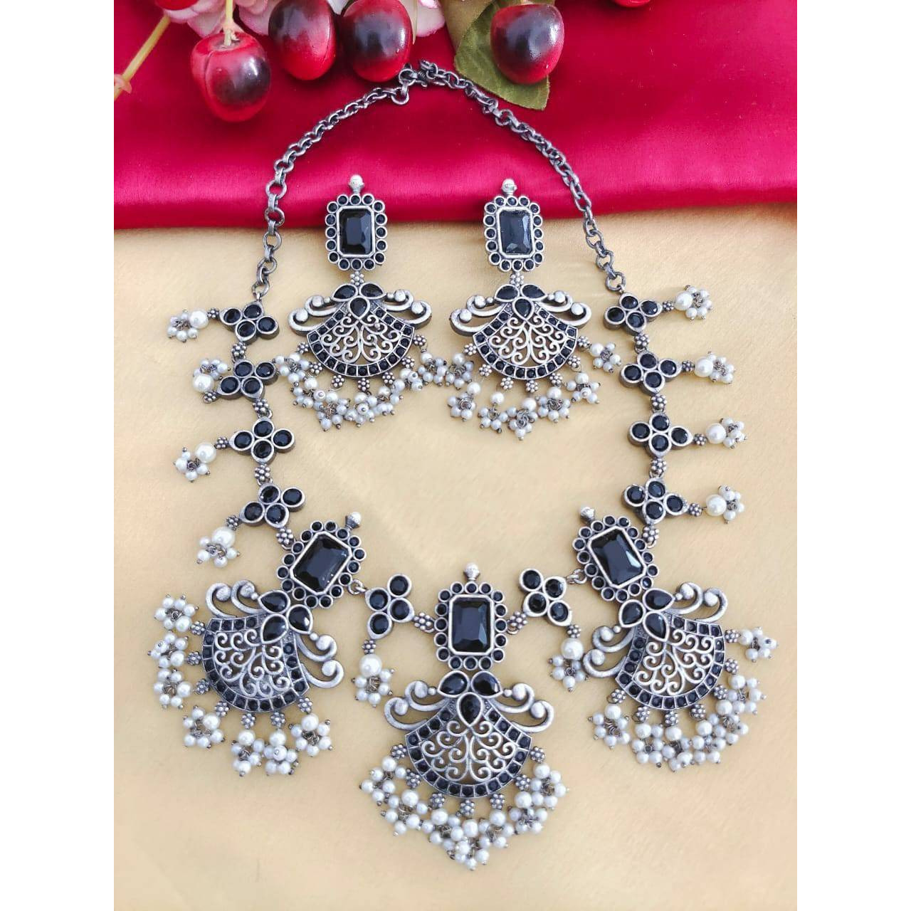 Adorn your wrist with a beautiful chime. This bracelet and ring adds a perfect amount of pretty you would like to add to your ethnic outfits. This Ghungroo bracelet kada and peacock Ring is crafted in German silver and shiny bells that create a melody of charm and beauty. An accessory that will complete your look with minimum effort and maximum style quotient