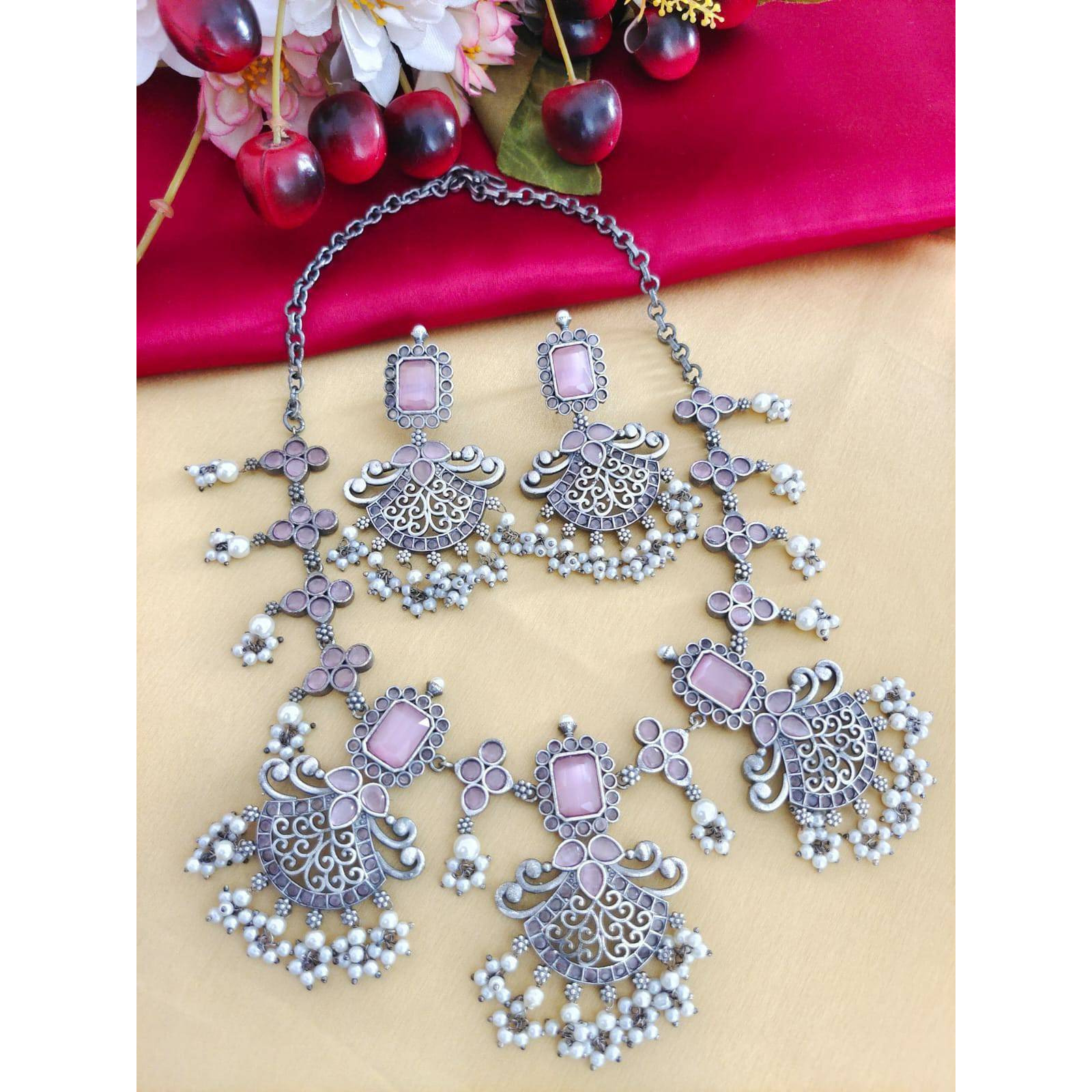 Adorn your wrist with a beautiful chime. This bracelet and ring adds a perfect amount of pretty you would like to add to your ethnic outfits. This Ghungroo bracelet kada and peacock Ring is crafted in German silver and shiny bells that create a melody of charm and beauty. An accessory that will complete your look with minimum effort and maximum style quotient