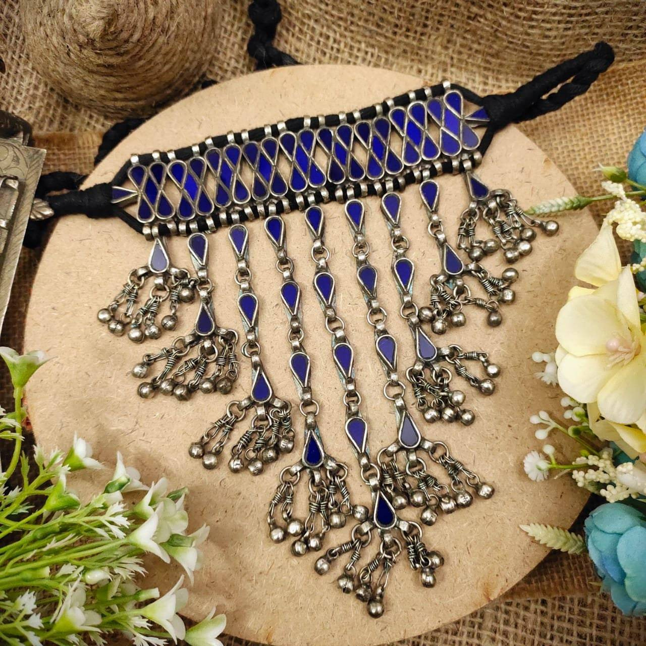This Exotic Oxidised mirror Earring For Women is made of Alloy. Women love jewellery specially traditional jewellery adore a women. They wear it on different occasion. They have special importance on ring ceremony, wedding and festive time. They can also wear it on regular basics. Make your moment memorable with this range. This jewel set features a unique one of a kind traditional embellish with antic finish.Premium quality