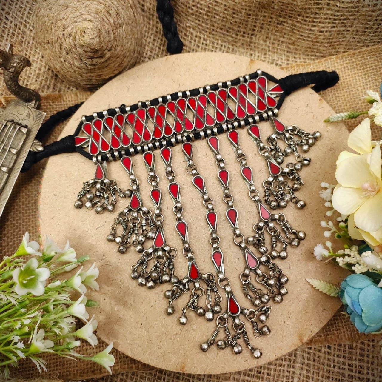 This Exotic Oxidised mirror Earring For Women is made of Alloy. Women love jewellery specially traditional jewellery adore a women. They wear it on different occasion. They have special importance on ring ceremony, wedding and festive time. They can also wear it on regular basics. Make your moment memorable with this range. This jewel set features a unique one of a kind traditional embellish with antic finish.Premium quality
