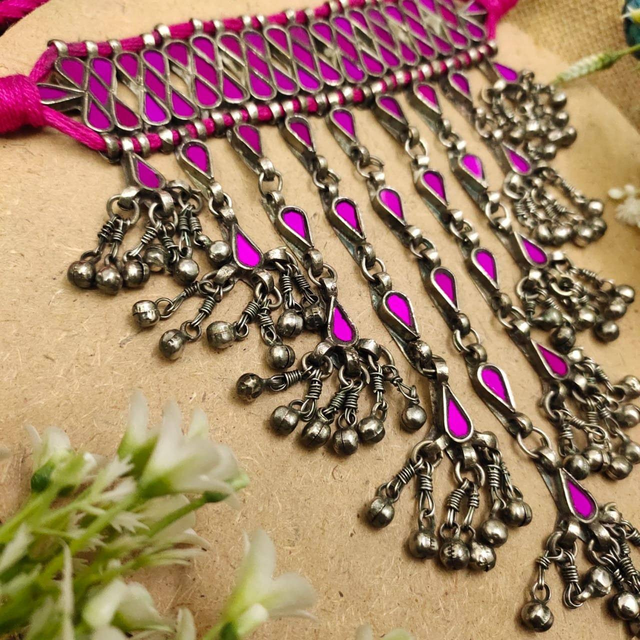 This Exotic Oxidised mirror Earring For Women is made of Alloy. Women love jewellery specially traditional jewellery adore a women. They wear it on different occasion. They have special importance on ring ceremony, wedding and festive time. They can also wear it on regular basics. Make your moment memorable with this range. This jewel set features a unique one of a kind traditional embellish with antic finish.Premium quality