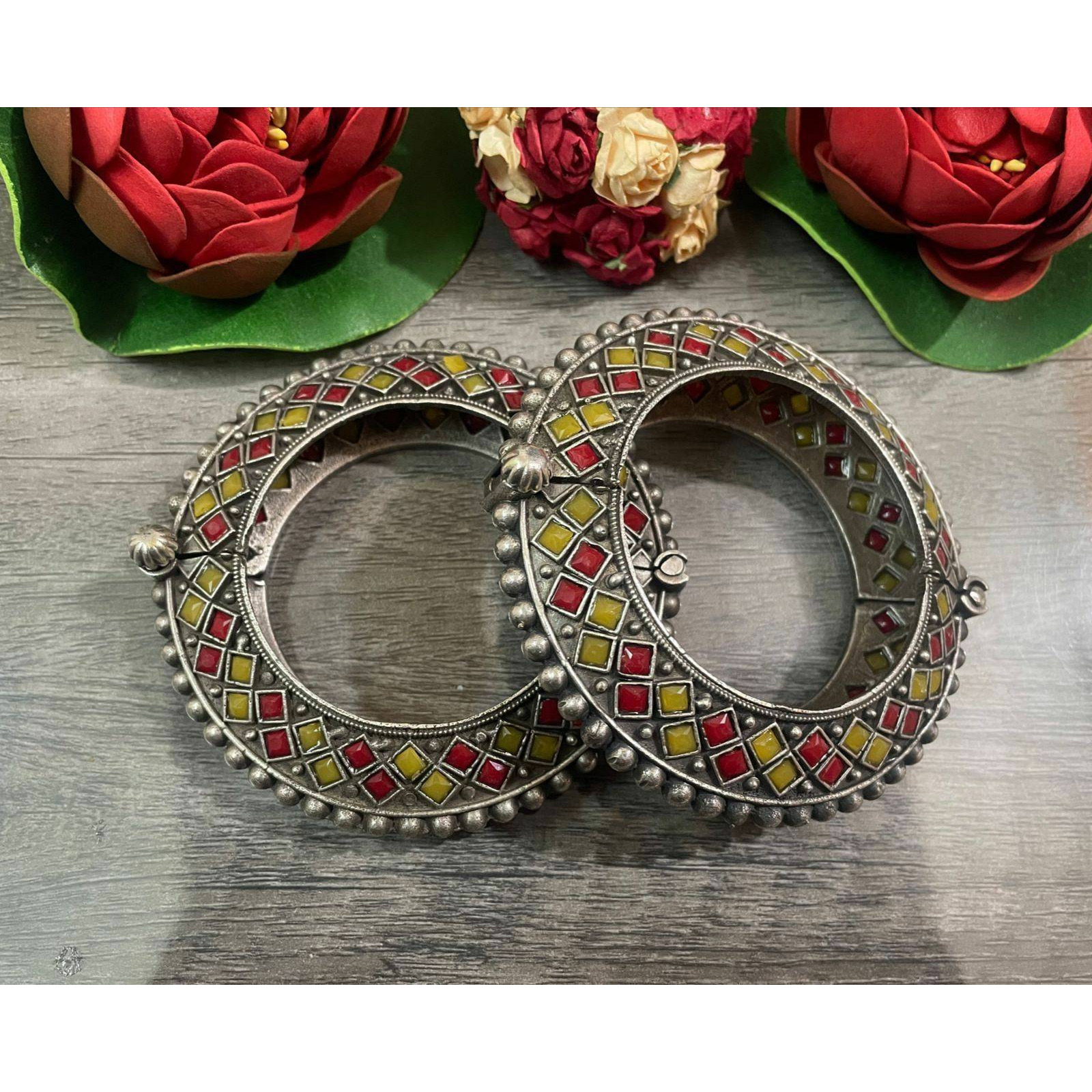 This three-layeredMaharashtrian neckpiece,handmade with German silver and coatedwith silver oxidized plating with beautiful goddess Lakshmi motifs, makes quite anaffirmation. Thisgold-plated silver pieceis not so heavy, but it fills your neck with damrushaped beads and adds unmatchable beauty. Pair it with your favourite saree or any Indo-western attires to add a lot of character and elegance to your entire look. As this necklace is handmade, it may have some irregularities or im