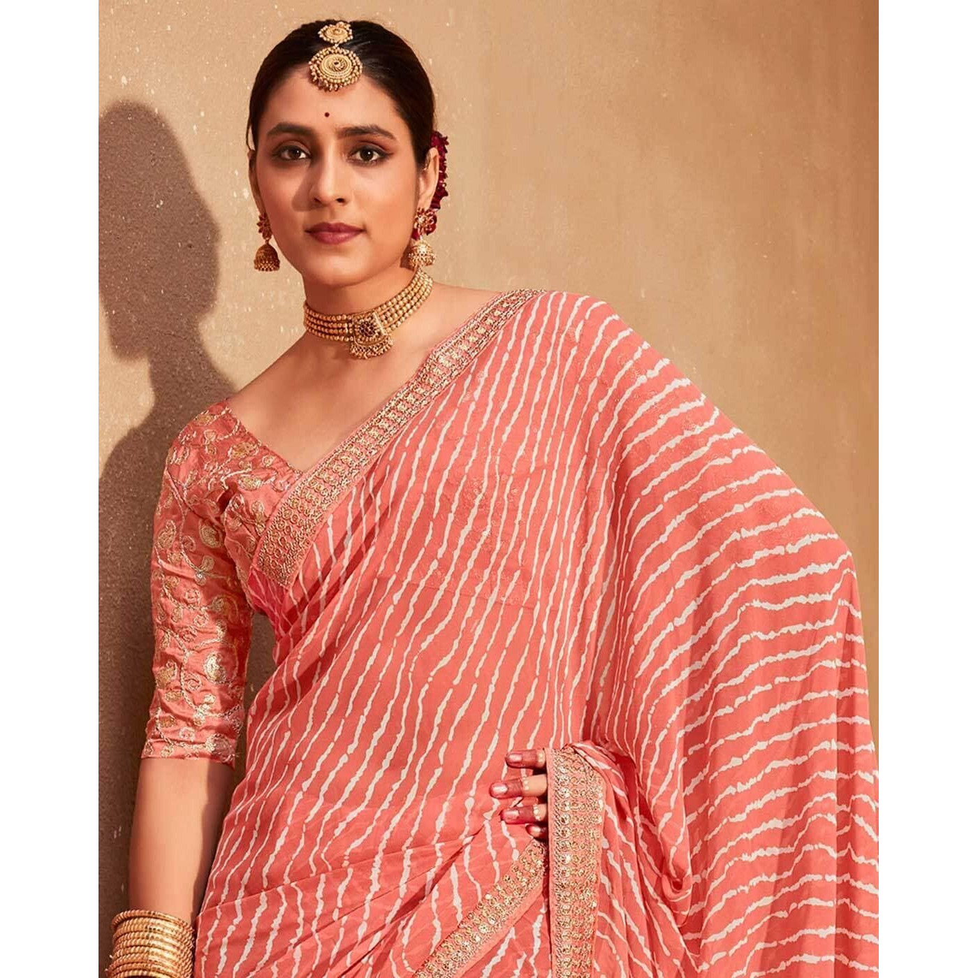 SIRIL Womens Leheriya Printed Georgette Saree with Unstitched Blouse Piece (2555S281_Peach)