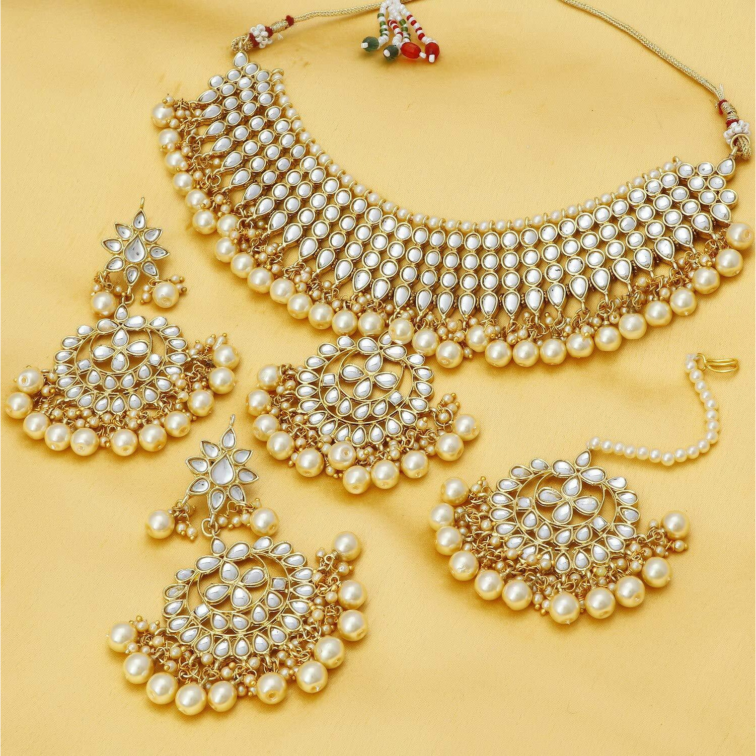 Sukkhi Trendy Kundan Gold Plated Wedding Jewellery Pearl Choker Necklace Set for Women (N73544)