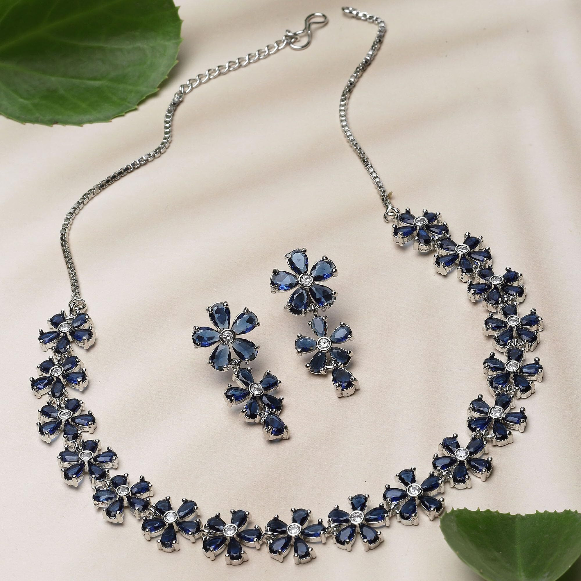 ZENEME Rhodium Plated Silver Toned White American Diamond Studded Flower Shaped Jewellery Set For Girls and Women (Navy Blue)