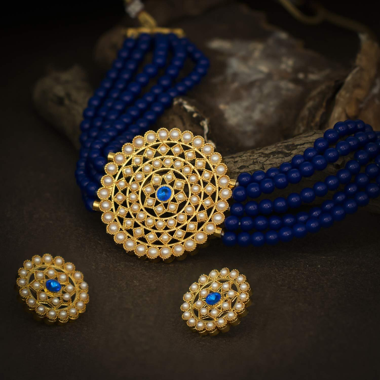 Sukkhi Lovely Gold Plated Dark Blue Pearl Choker Necklace Set with Stud Earring for Women
