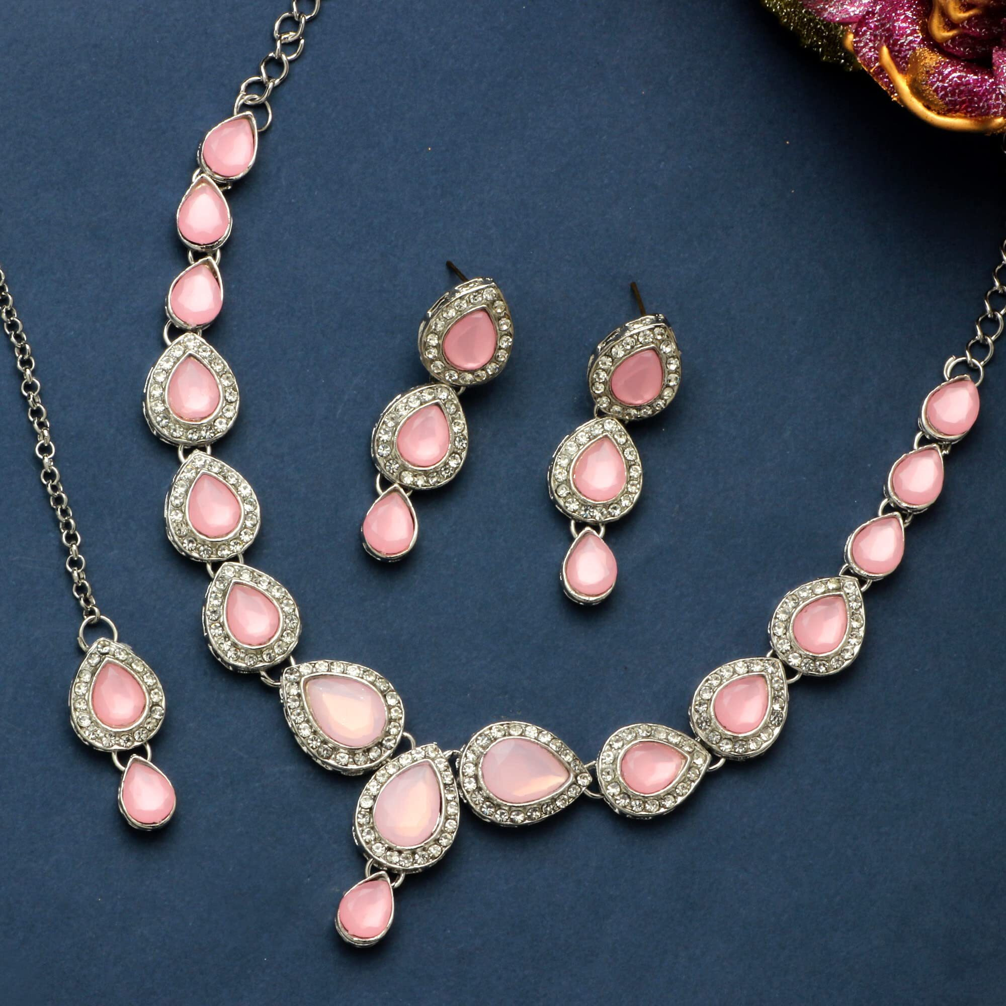 Atasi International Pink Color Crystals Silver Plated Kundan Necklace Jewellery Set with Earrings and Maang Tikka for Party, Wedding, Engagement (MNP1784)