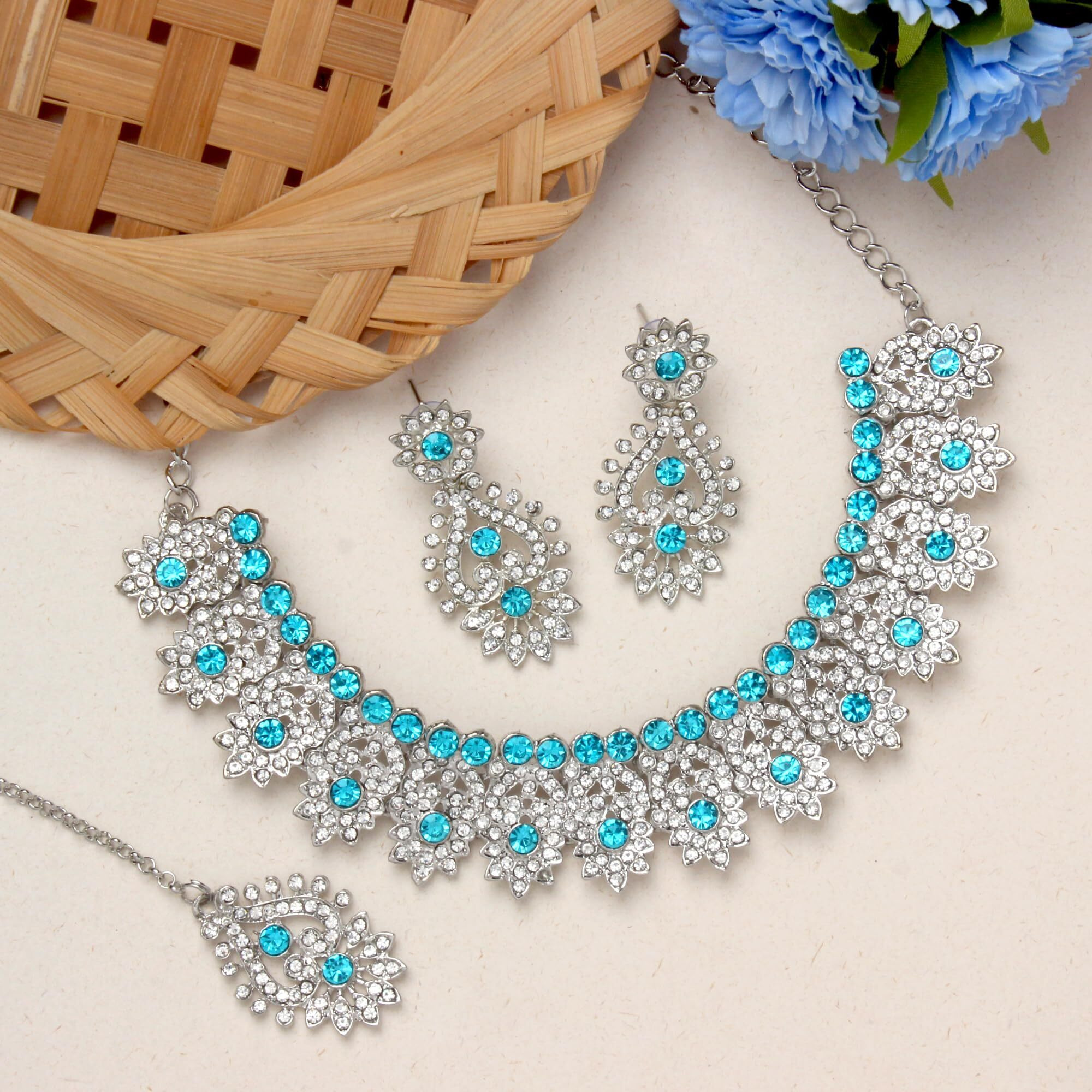 Atasi International Silver Plated Crystal AD Necklace Set with Earrings and Maang Tikka For Women Suitable for Bridal, Wedding, Party & Festive Occasional Wear (Aqua Blue)
