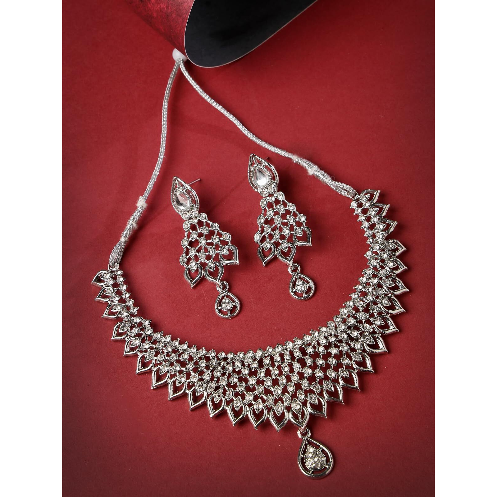 Sukkhi Striking Rhodium Plated Silver AD White Stone Collar Bone Necklace Set And Earring | Jewellery Set For Women (NS105661)