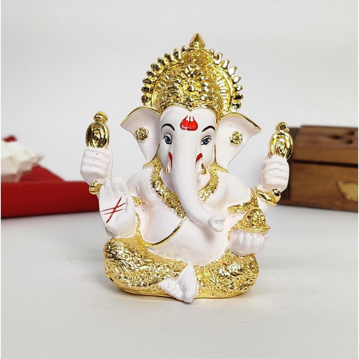 Gold Art India Mukut Ganesha Statue Gold Plated | Car Dashboard | Office Desk/Home Dcor | Gifting | House Warming | | 150g | 3.3 Height | (4HANDMUKUTGOLDWHITE)