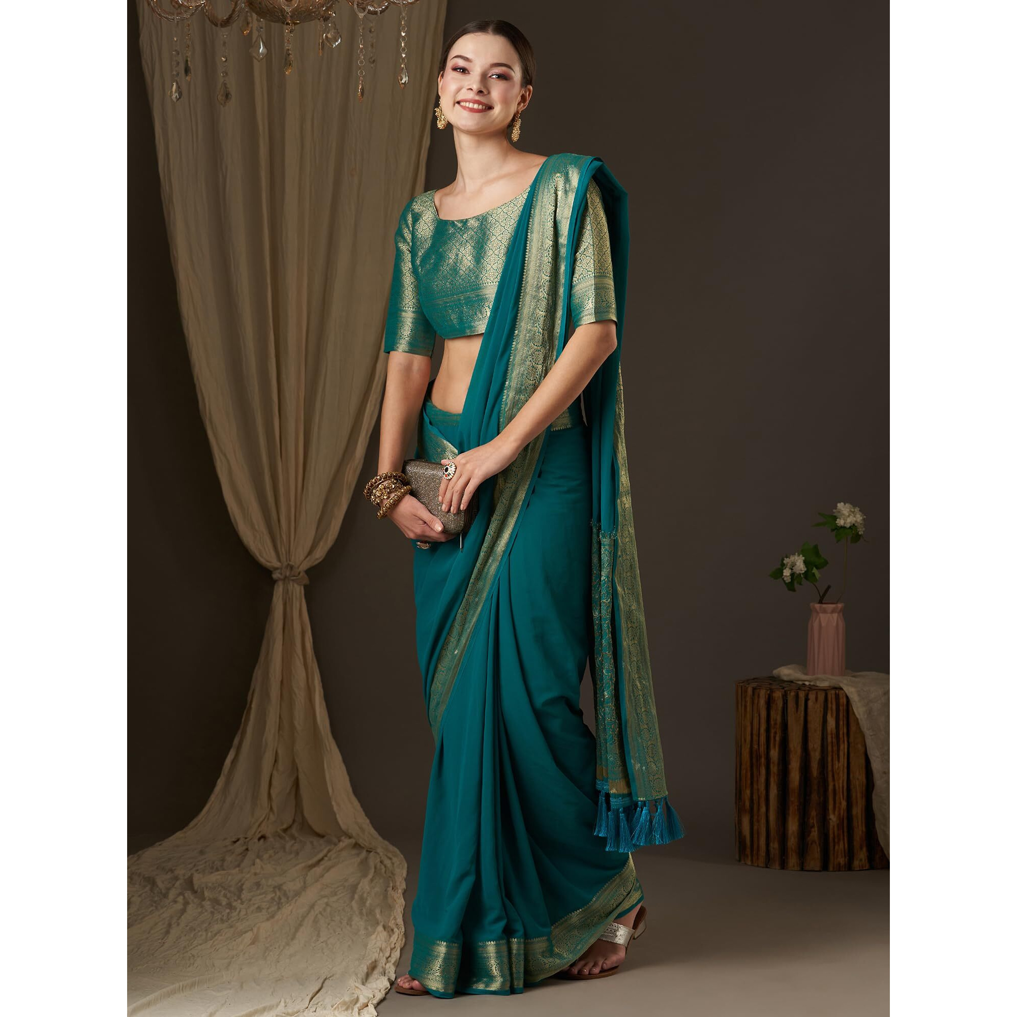 AKHILAM Womens Woven Design Solid Georgette Kanjeevaram Saree With Unstiched Blouse Piece (Blue_ARYA7002_FL)