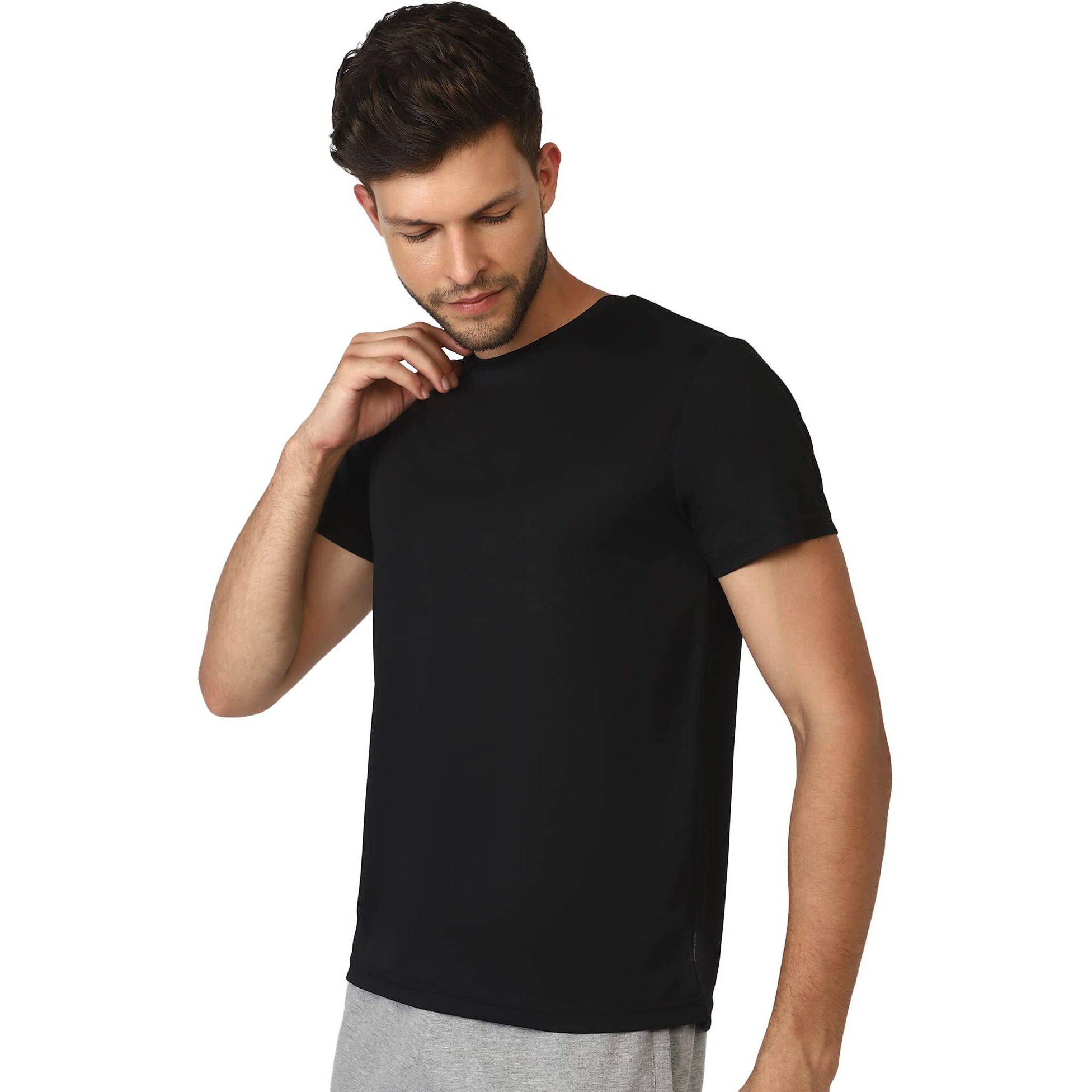 hummel Budoc Round Neck Half Sleeve Solid Regular fit Polyester T-shirt for Men Comfortable Breathable Fabric Stretchable for Everyday Use Ideal for Yoga Training Gym Running or Performance Black