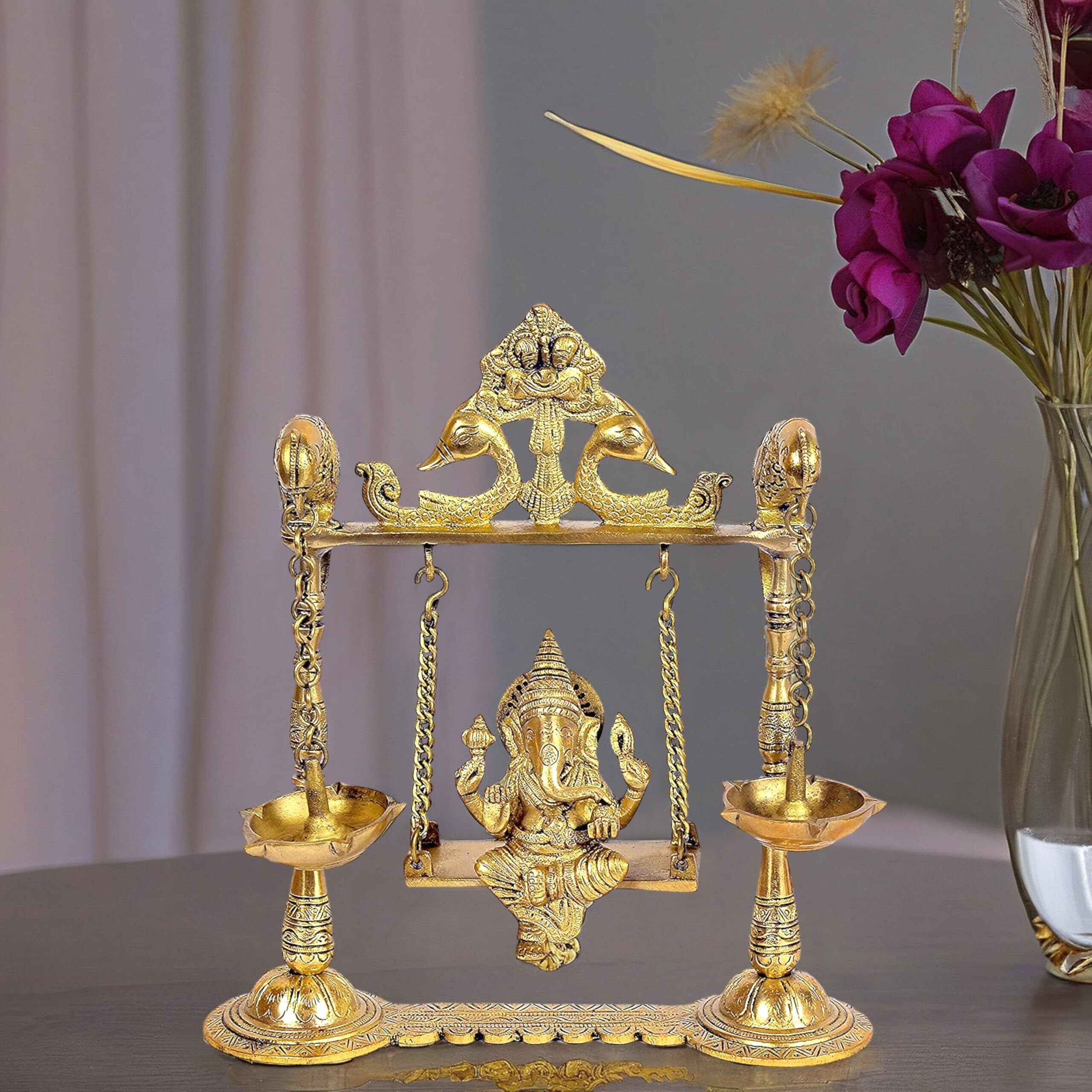 Amazon Brand - Umi Brass Ganesha on a Swing with Two Parrot Holding Oil Lamp for Home Decor (Golden) Height- 8.5 Inches