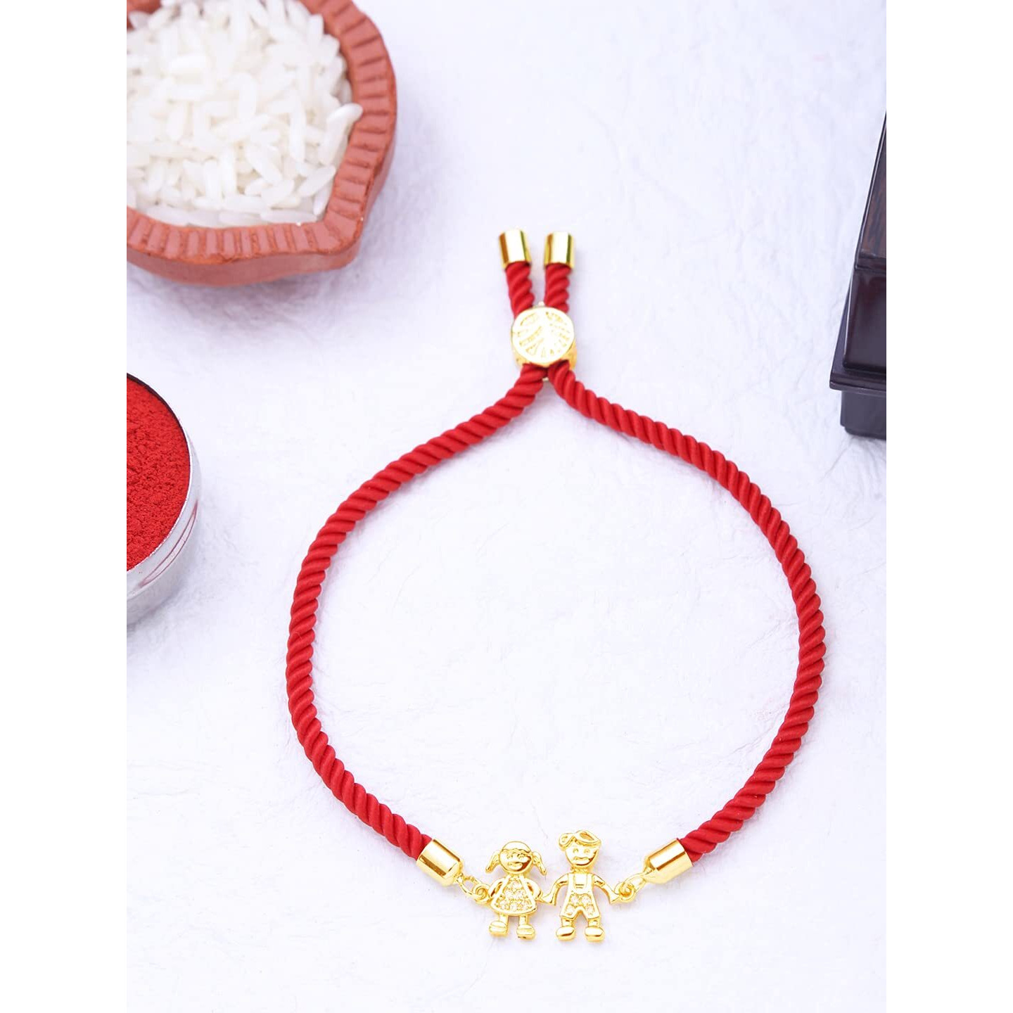 Yellow Chimes Rakhi Bracelet for Brother Rakhi Gift for Brother Gold Toned Brother Sister Red Rakhi Bracelet for Men and Women.