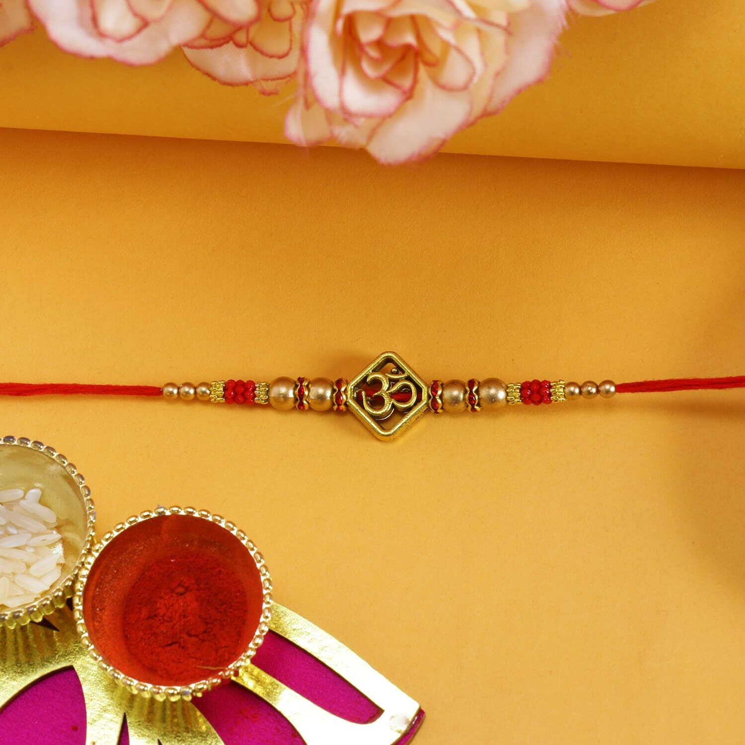 Riddhika Ventures Glorious Gold Plated Auspicious and Diamond Ring Rakhi with Roli Chawal and Greeting Card (D9)