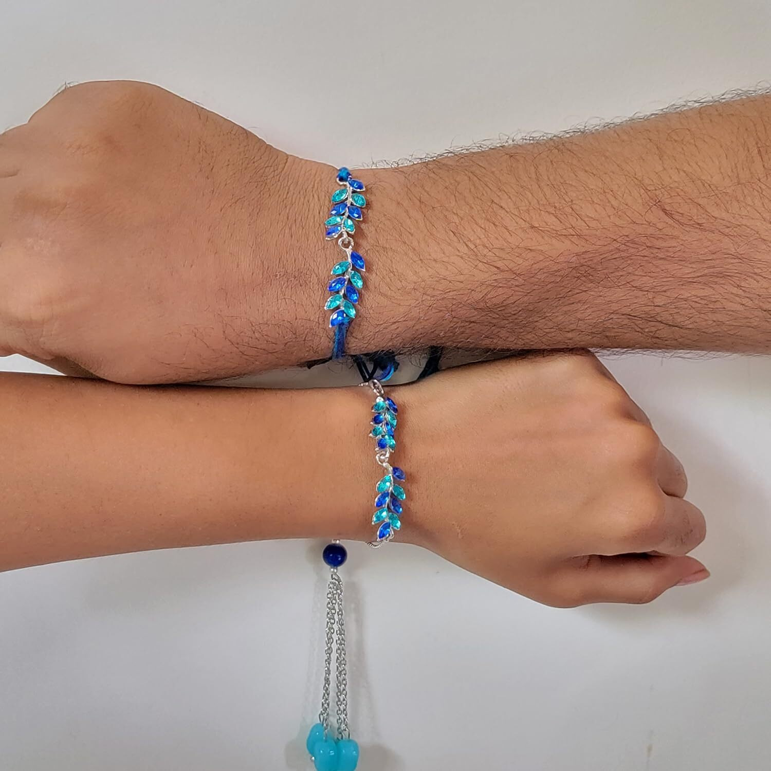 Mahi Light and Dark Blue Leafy Shape Crystals Lumba and Brother Rakhi Set for Bhaiya and Bhabhi (RCOL1105521RBlu)