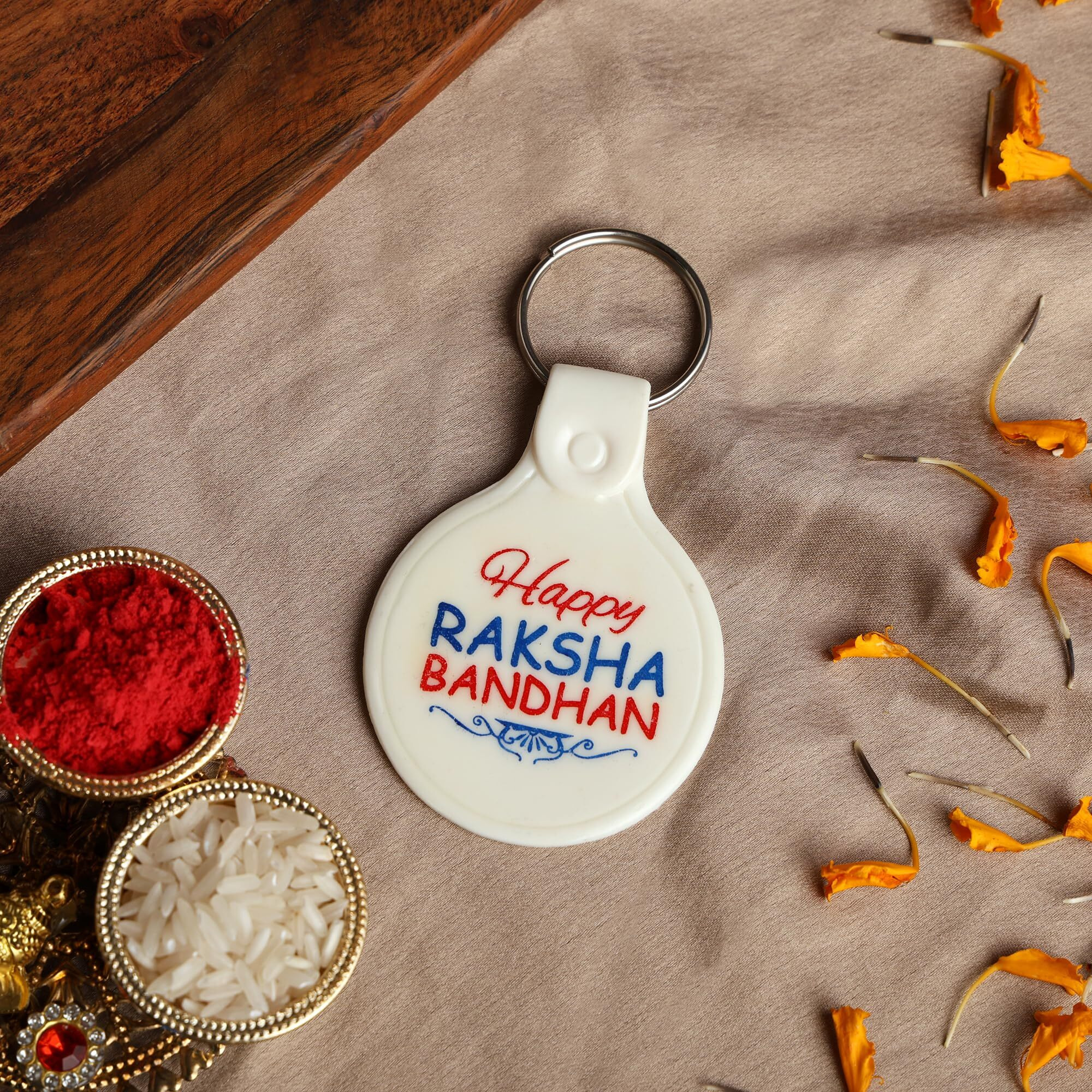 Riddhika Ventures Religious Meenakari Om and Stylish Kundan Rakhi (Set of 2) with Roli Chawal, Greeting Card and and One Motivational Keychain (P2P3K)