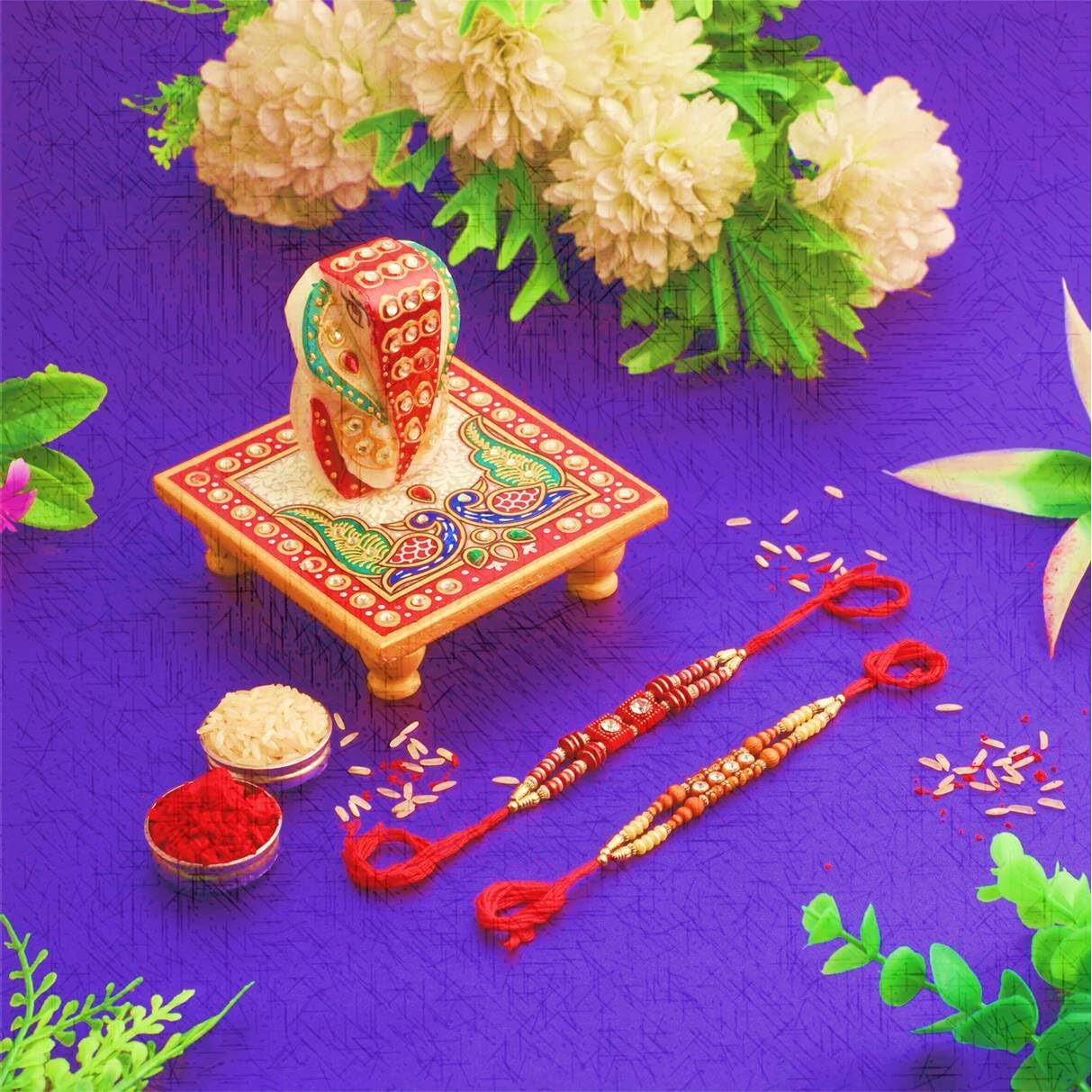 Purpledip Rakhi Set For Brother Marble Aasan Ganesha, Set of 2 Rakshabandhan Bracelets & Auspicious Roli Chawal Tika For Men (rakhi1b)