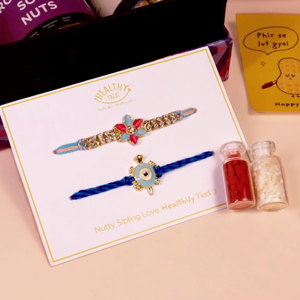 Healthy Treat Flavorful Rakhi Gift Hamper | Roasted Healthy Snacks Gift Pack | A pair of Rakhi, Roli Chawal, Rakhi Cards | Rakhi gifts for Brother and Sister | The Ultimate Assorted Rakhi Gift Hamper | Raksha Bandhan Gift Hamper