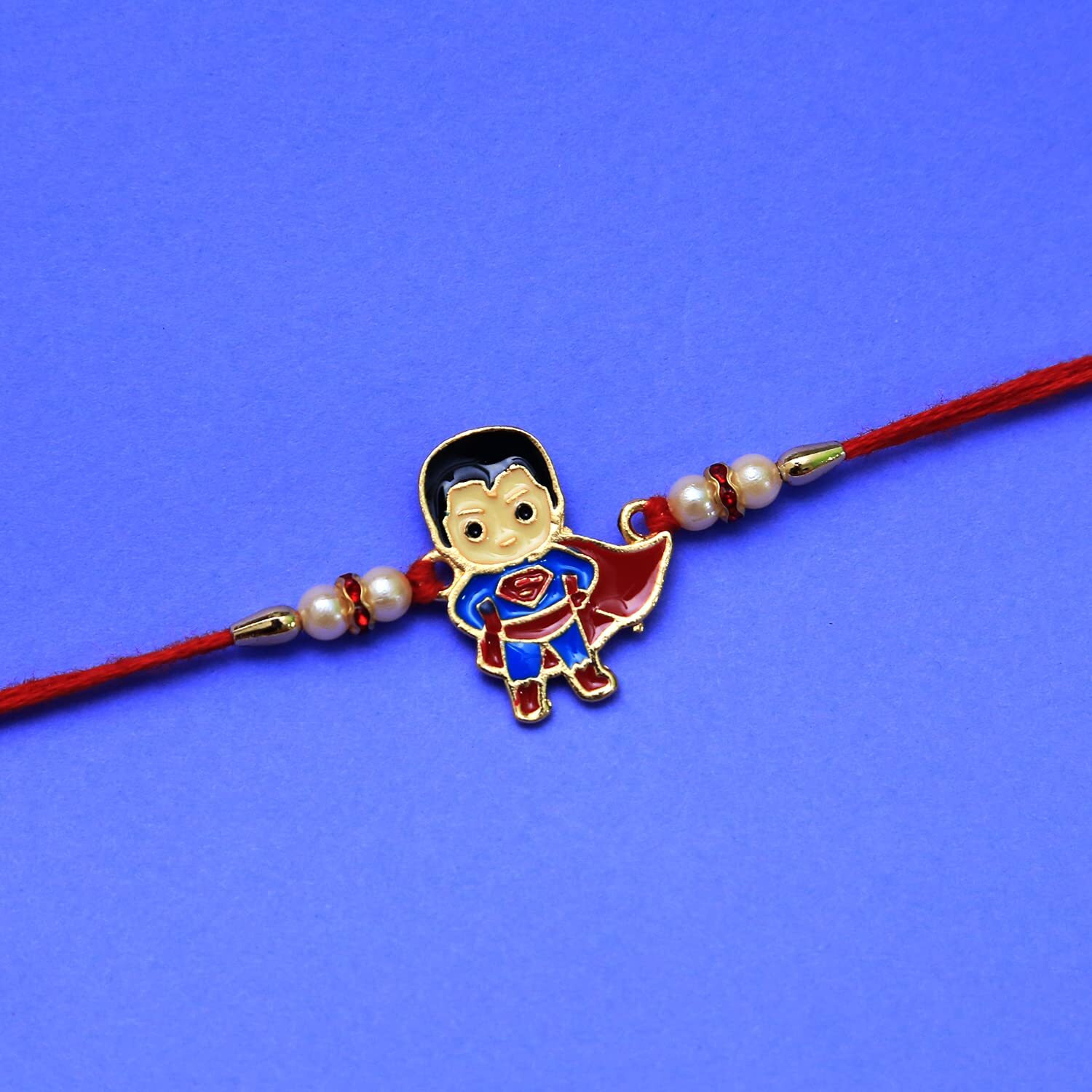 KKR Enterprise- Super Man Kids cartoon rakhi & om rakhi For Boys, Girls Rakhi For Kids/Little Brother/Bhai Rakhi/Raksha Bandhan Roli Chawal (combo)